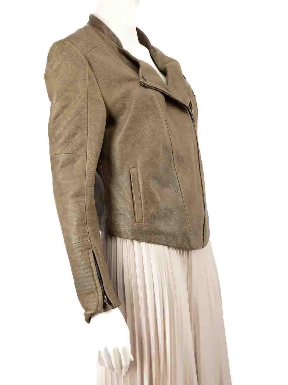 CONDITION is Very good. Minimal wear to jacket is evident. Minimal wear to the front buttons with light scratches to the metal on this used Francis Leon designer resale item.
 
 
 
 Details
 
 
 Khaki
 
 Leather
 
 Biker jacket
 
 Asymmetric zip
