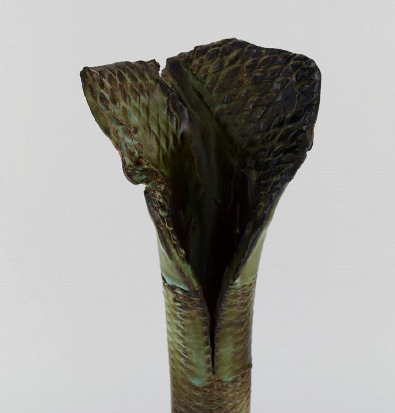 Francis Milici (b. 1952) for Vallauris. 
Organically shaped unique vase in glazed ceramics. Beautiful glaze in green and soil shades. 1980s.
Measures: 40 x 11 cm.
In excellent condition.
Signed.
