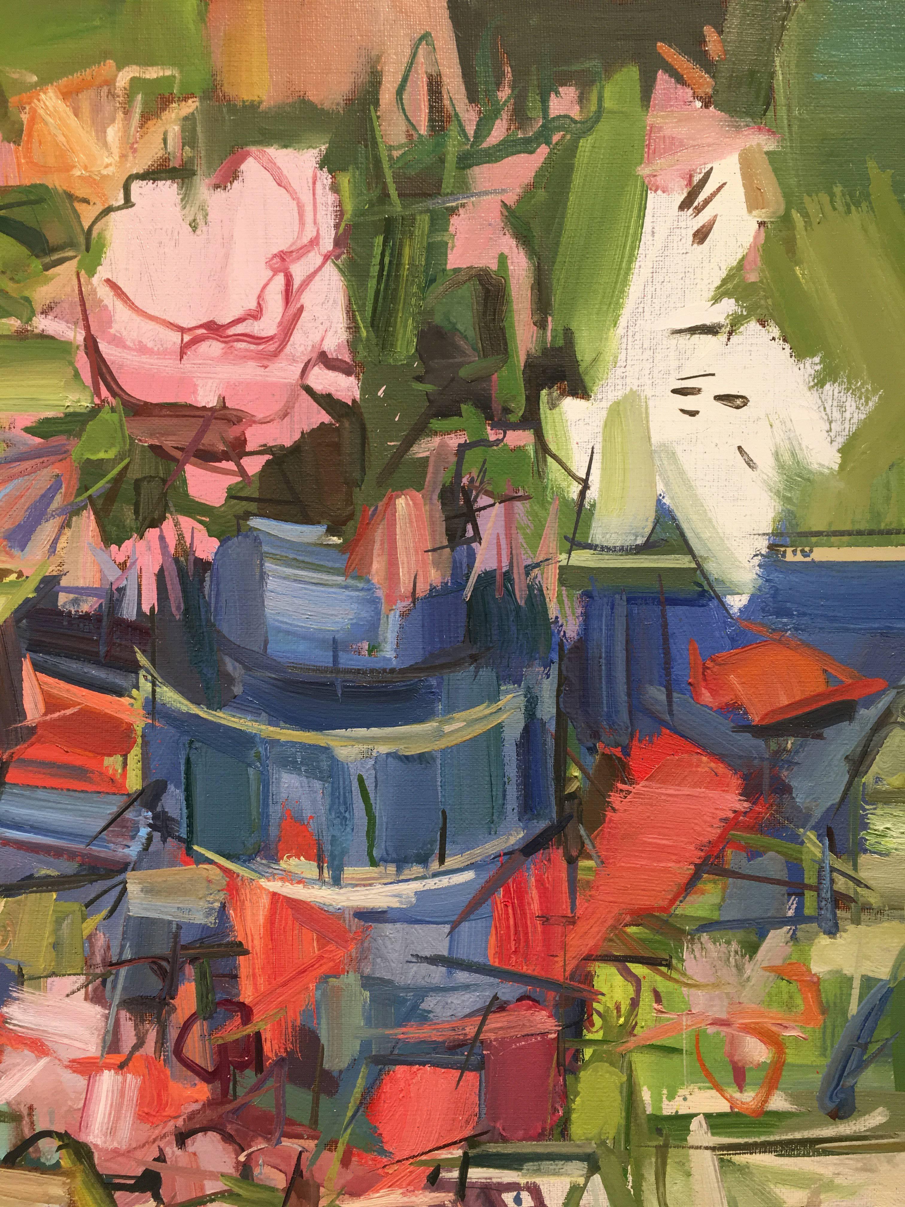 Colorful painting of flowers in a dark blue vase from Francis Sills' 2017 series of Flora Paintings. The flowers, a pink rose and a white lily, contrast the verdant green background. The arrangement is reflected in the surface of the table, doubling
