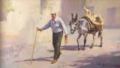 A farmer with his donkey