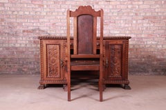 Francisco Sobrinho Ornate Carved Walnut Desk and Chair, Brazil, 1930s