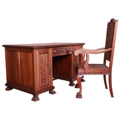 Francisco Sobrinho Ornate Carved Walnut Desk and Chair, Brazil, 1930s