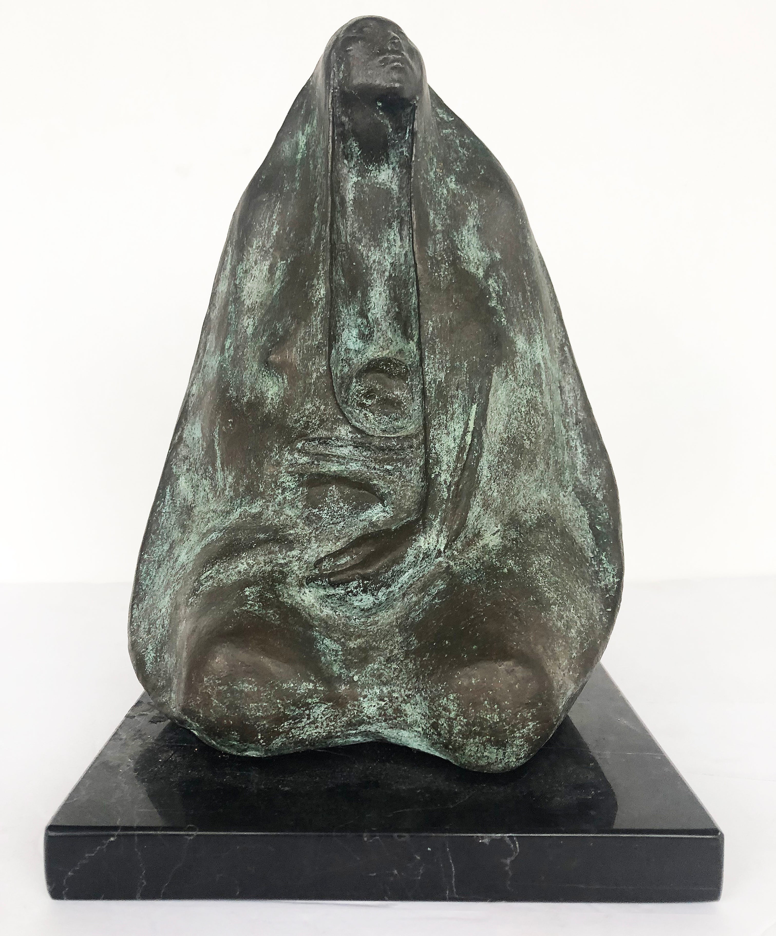 Francisco Zúñiga Bronze Patinated Sculpture on Marble Base

Offered for sale is an original Francisco Zúñiga (1912 - 1998) bronze sculpture with a green patina depicting a mother and child. The sculpture is raised on a square marble base and is