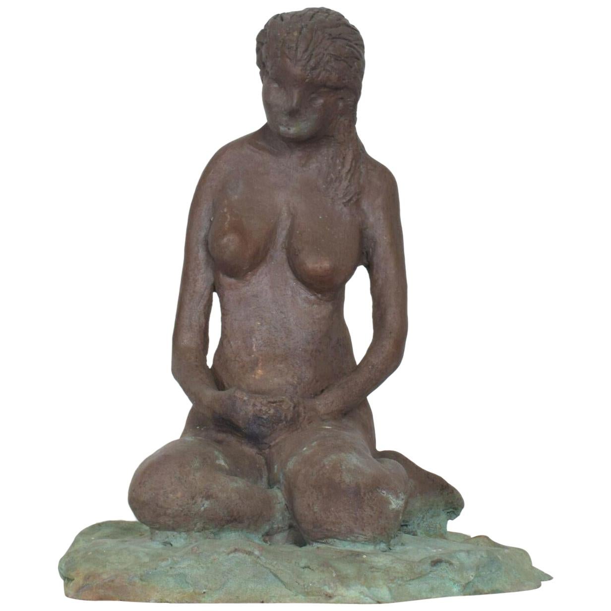 Sculpture
1970s Sitting nude female sculpture cast in bronze, manner and style sculptor Francisco Zuniga.
Signed and unable to read.
Dimensions: 8.5 H x 8D x 7.5 W
In original preowned vintage condition. 
Refer to images.