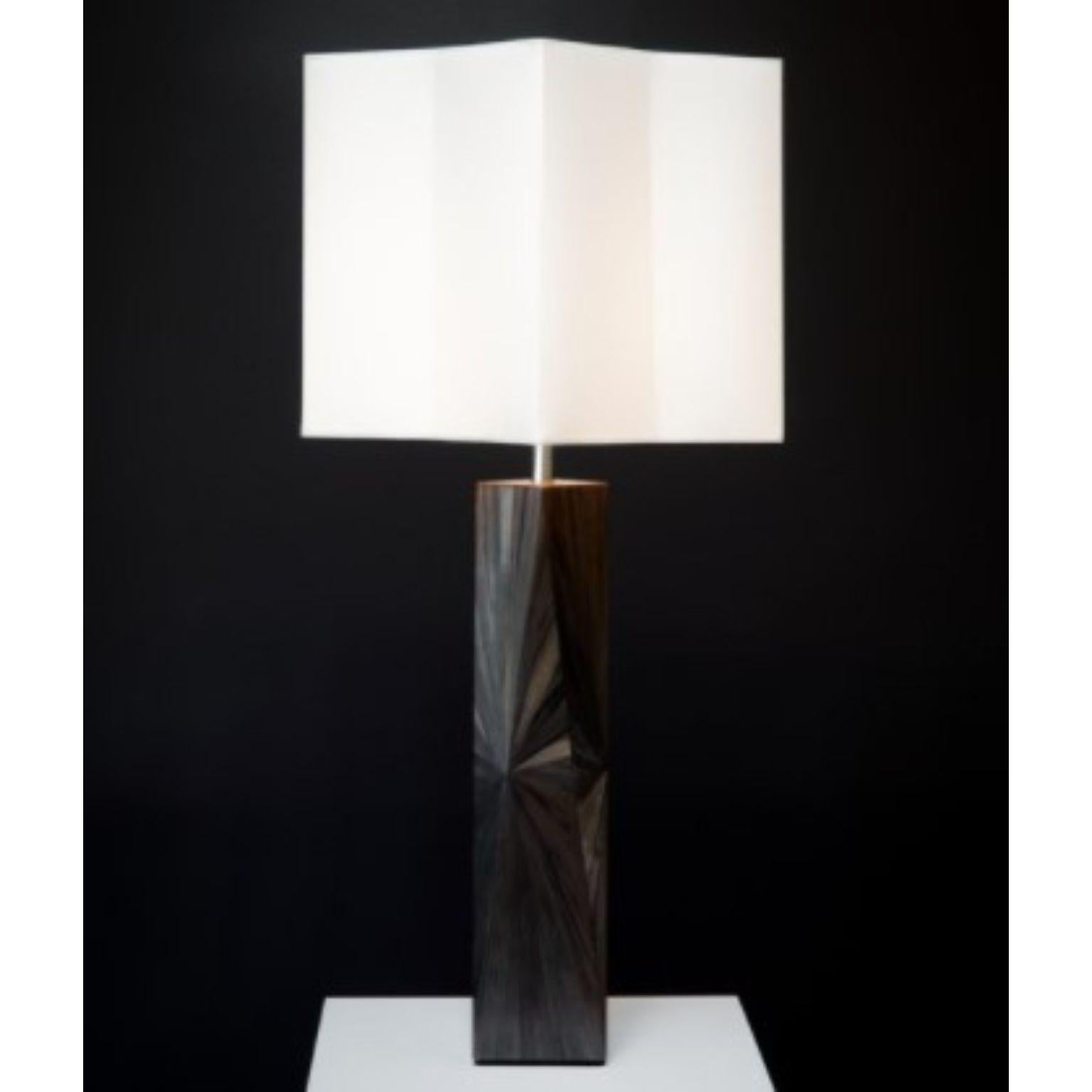 Franck black table lamp by Pierre-Axel Coulibeuf
Dimensions: W40 x D40 x H78 cm
Materials: Straw Marquetry, Nickel
Edition of 20 + 4AP
The Franck lamp is available in a variety of colors.

All our lamps can be wired according to each country.