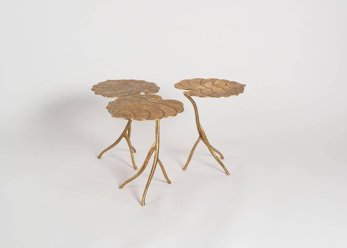 Franck Evennou's remarkable Taro nesting tables mimic the Asian root's broad leaves and stem, and his choice of material, and the evidence of his masterful hand, serve to contrast, as well as to amplify, the tables' beautifully natural and