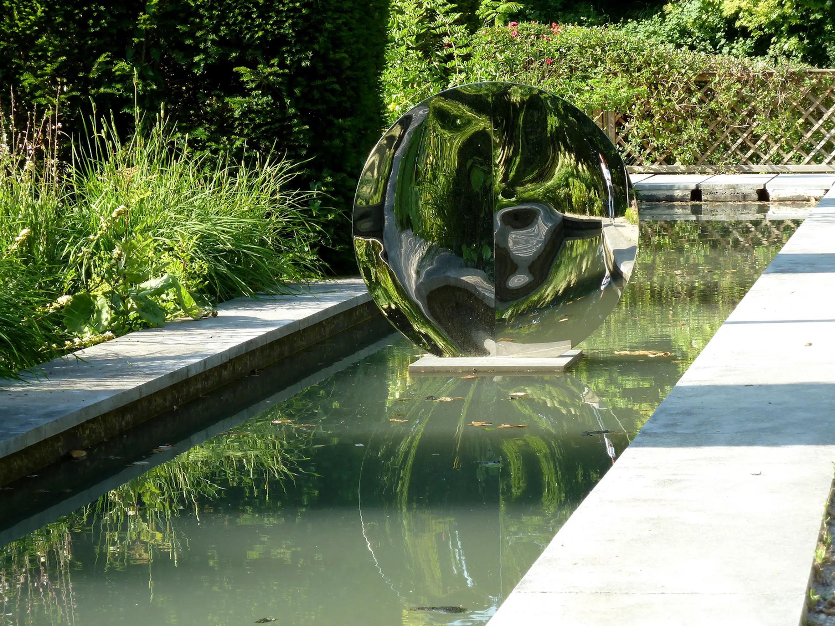 Mirror “with fold” 123 is a unique mirror-polished stainless steel sculpture and concrete base by contemporary artist Franck K, dimensions are 143 × 123 × 56 cm (56.3 × 48.4 × 22 in). 
The sculpture is signed and comes with a certificate of