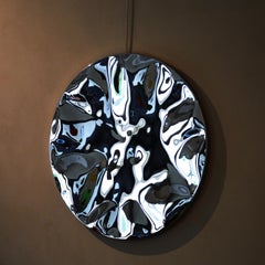 Espejo de pared "Destrozado" I de Franck K - escultura mural de acero, reflejo