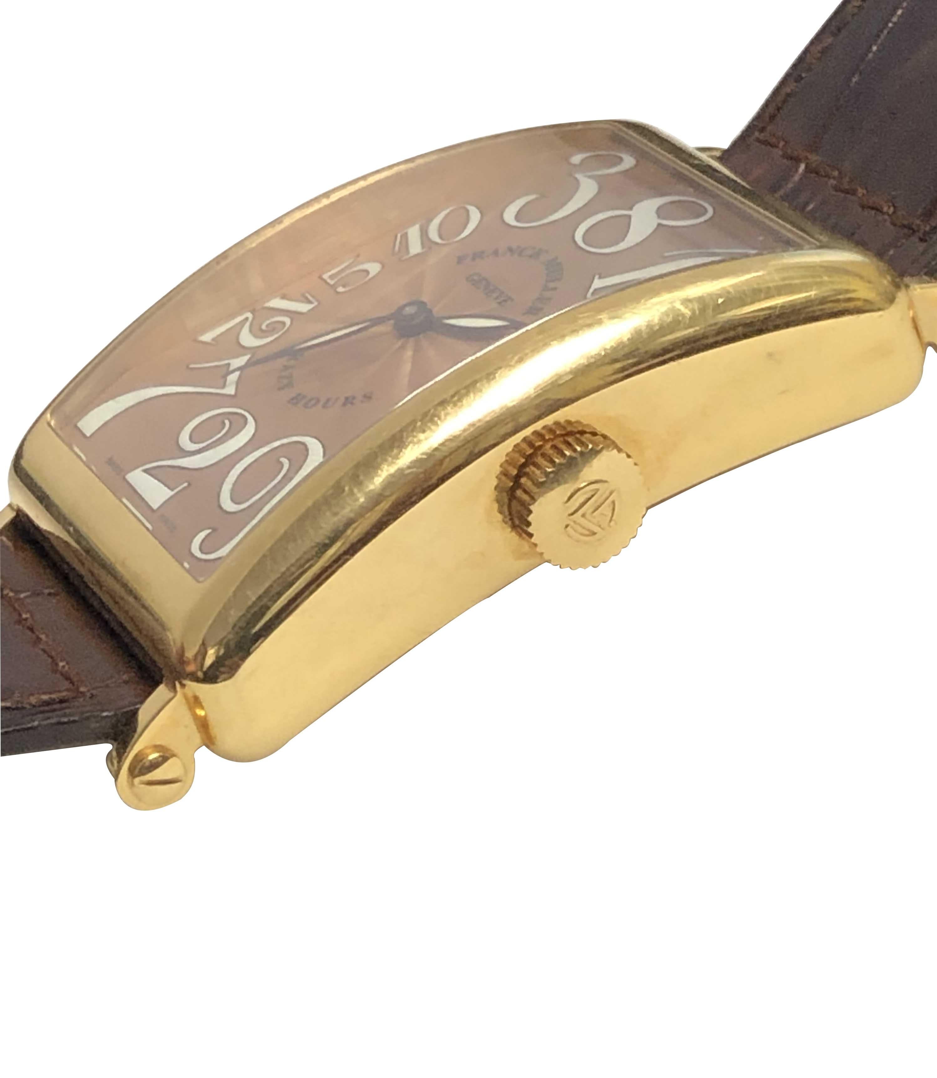 Circa 2005 Franck Muller, Long Island, Master of Complications, Crazy Hours, Ref: 1200 CH, Limited Edition No. 40.  18K Yellow Gold 45 M.M. ( not including lugs ) X 33 M.M. X 9 M.M. thick. Automatic, Self winding movement. Rose Guilloche Enamel Dial