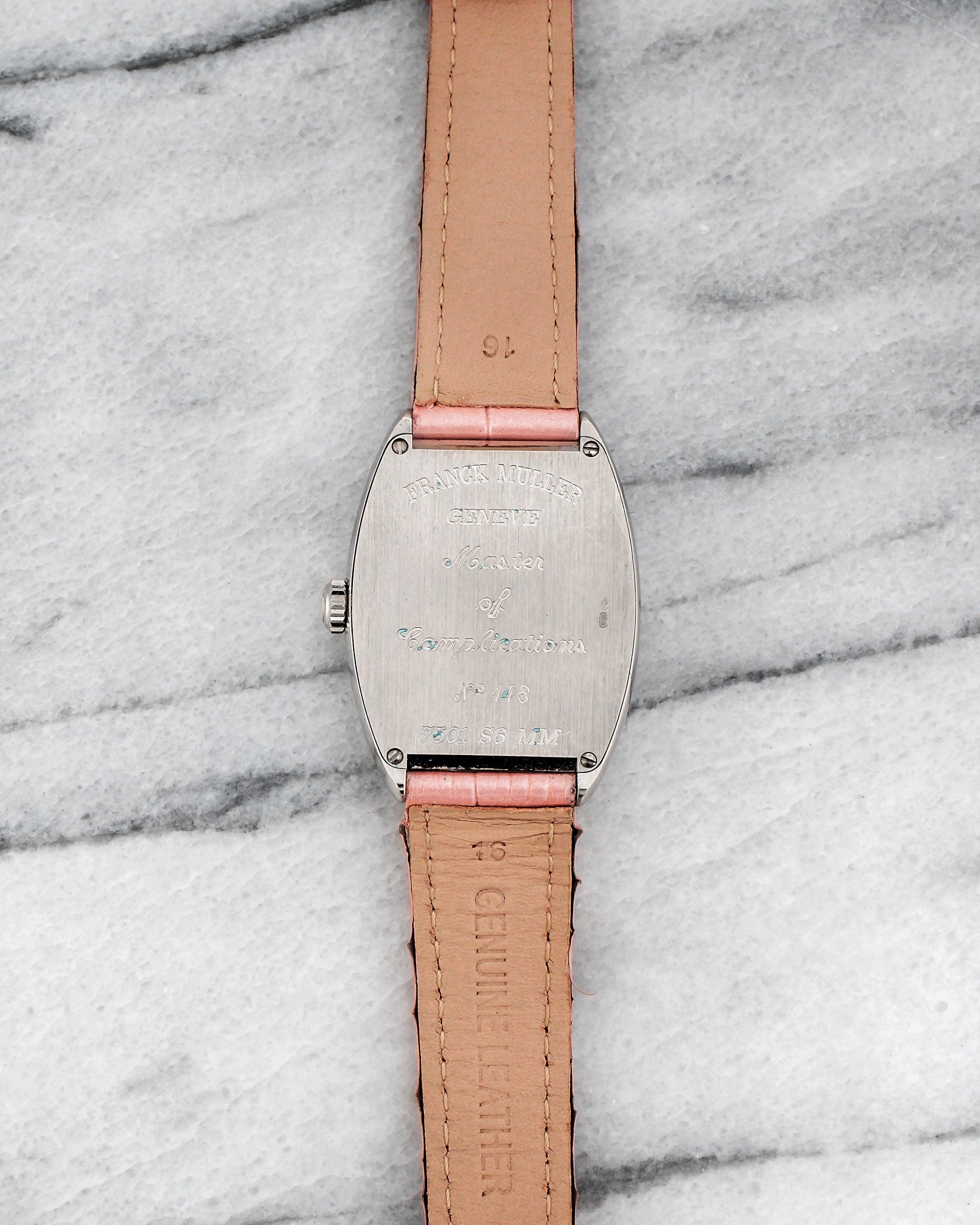 Here's a neo-vintage Franck Muller reference 7501 automatic in 18k white gold with a white Arabic numeral dial on a leather strap from the 1990s. Keeps great time and is fully functional. Measurements include a 29x39mm case size and 16mm lug width.