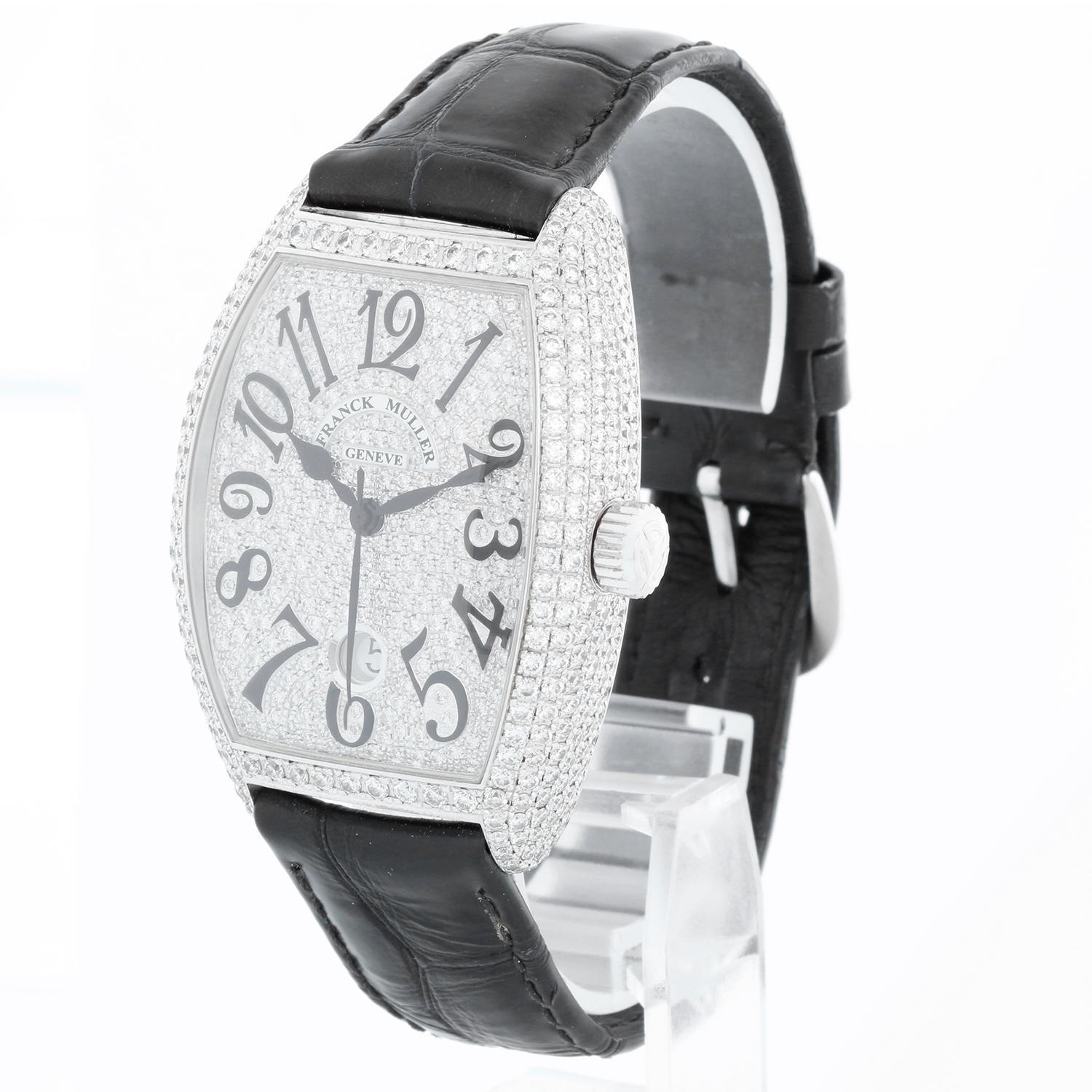 Franck Muller Casablanca 18K White Gold Diamond Watch 7880 SC DT D6 CD - Automatic. 18K white gold case with pave diamond case; tonneau ( 39 mm x 50 mm ). Pave diamond dial with date at 6 o'clock. Black strap with a Franck Muller diamond buckle.