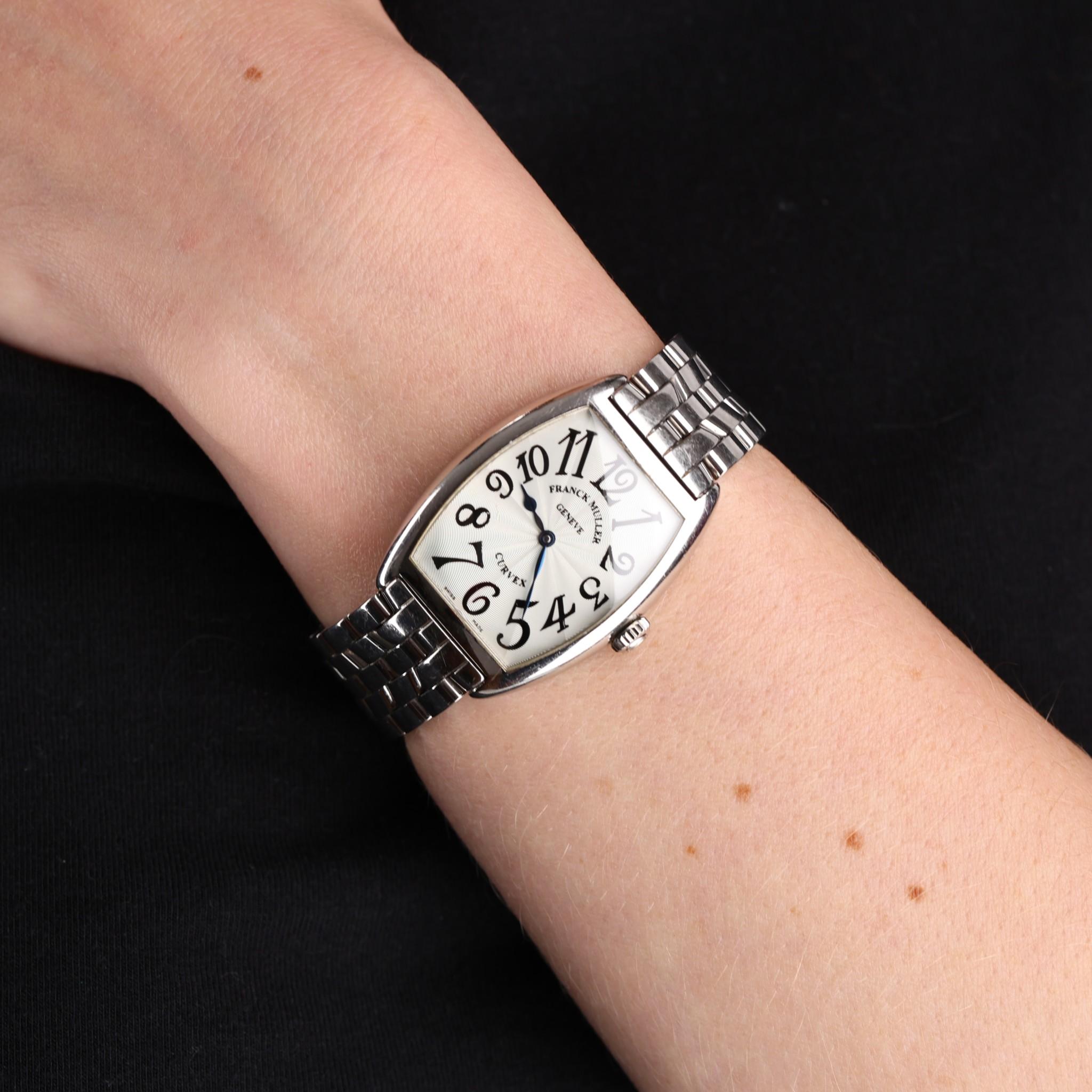 Franck Muller Cintrée Curvex Watch In Stainless Steel

The brand's signature design - Cintrée Curvex watch in stainless steel with barrel-shaped case and silver dial adorned with oversized stylised Arabic numerals.

Featuring five-link steel