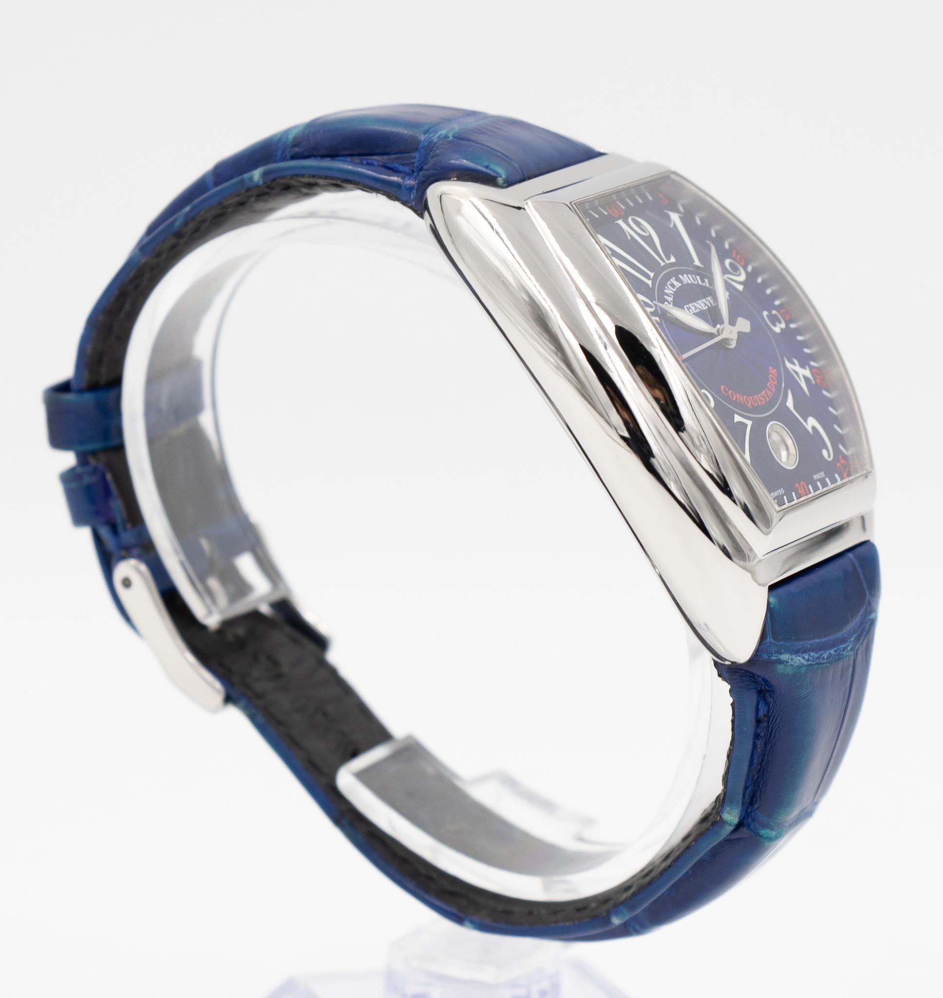 This Franck Muller Conquistador came to our store as a trade and comes with the original box. This timepiece features a 34mm stainless steel case, a blue dial with a matching blue strap and a stainless steel bracelet. Also, it's powered with an