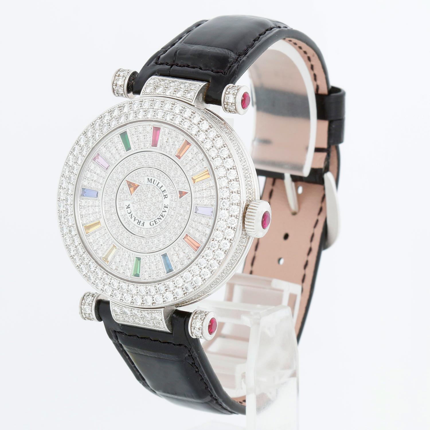Franck Muller Double Mystery 18K White Gold Diamond Watch DRM D 2R CD - Automatic. 18K white gold case with pave diamond case ( 39 mm ). Pave diamond dial with multi color hour markers. New Black Franck Muller Strap with 18K white gold buckle.