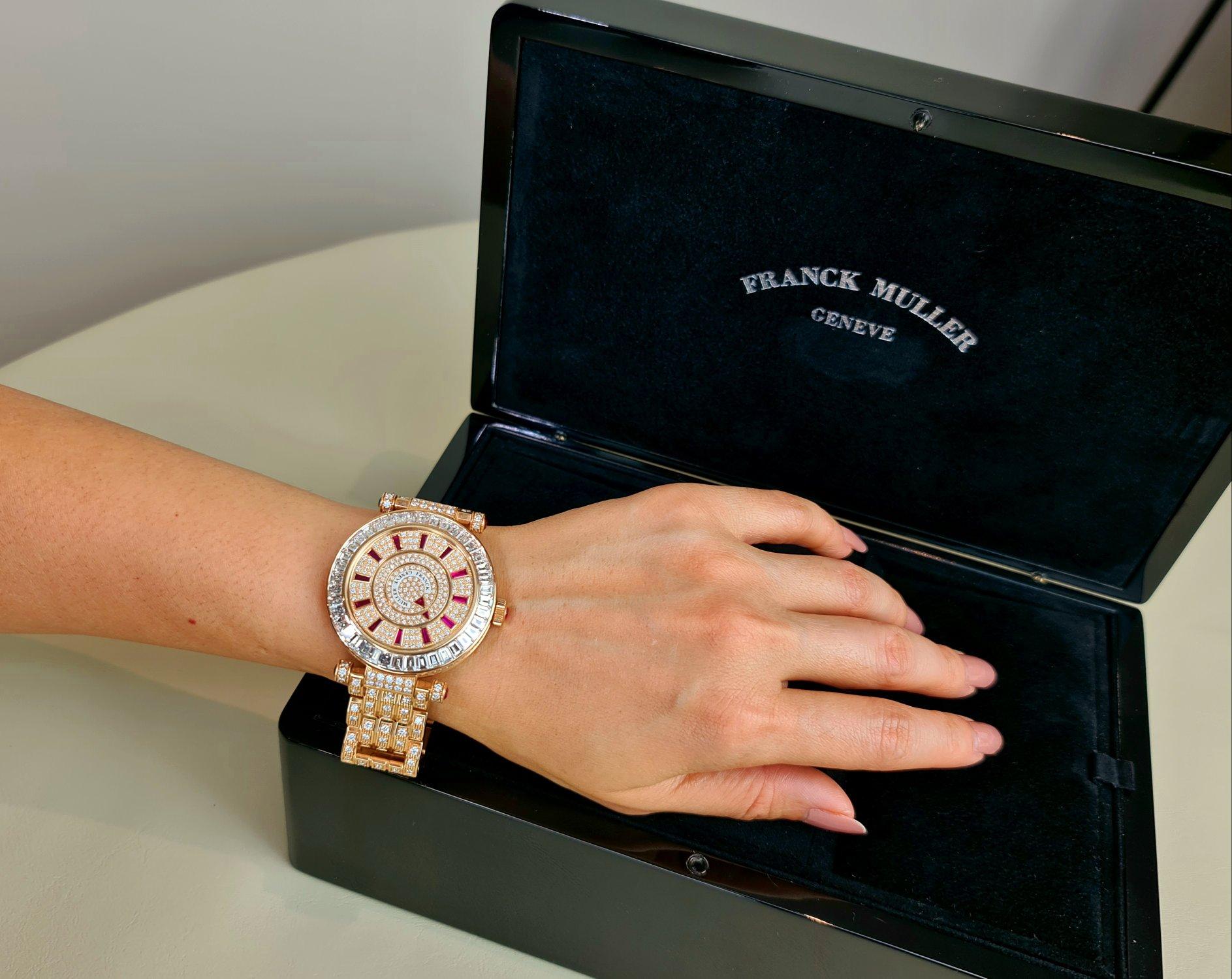 This show-stopping automatic wristwatch by Swiss luxury watch manufacturer, Franck Muller is an exquisite masterpiece that will have all eyes centred upon you. The diamond dial with baton ruby markers is bordered by a fixed bezel composed of a