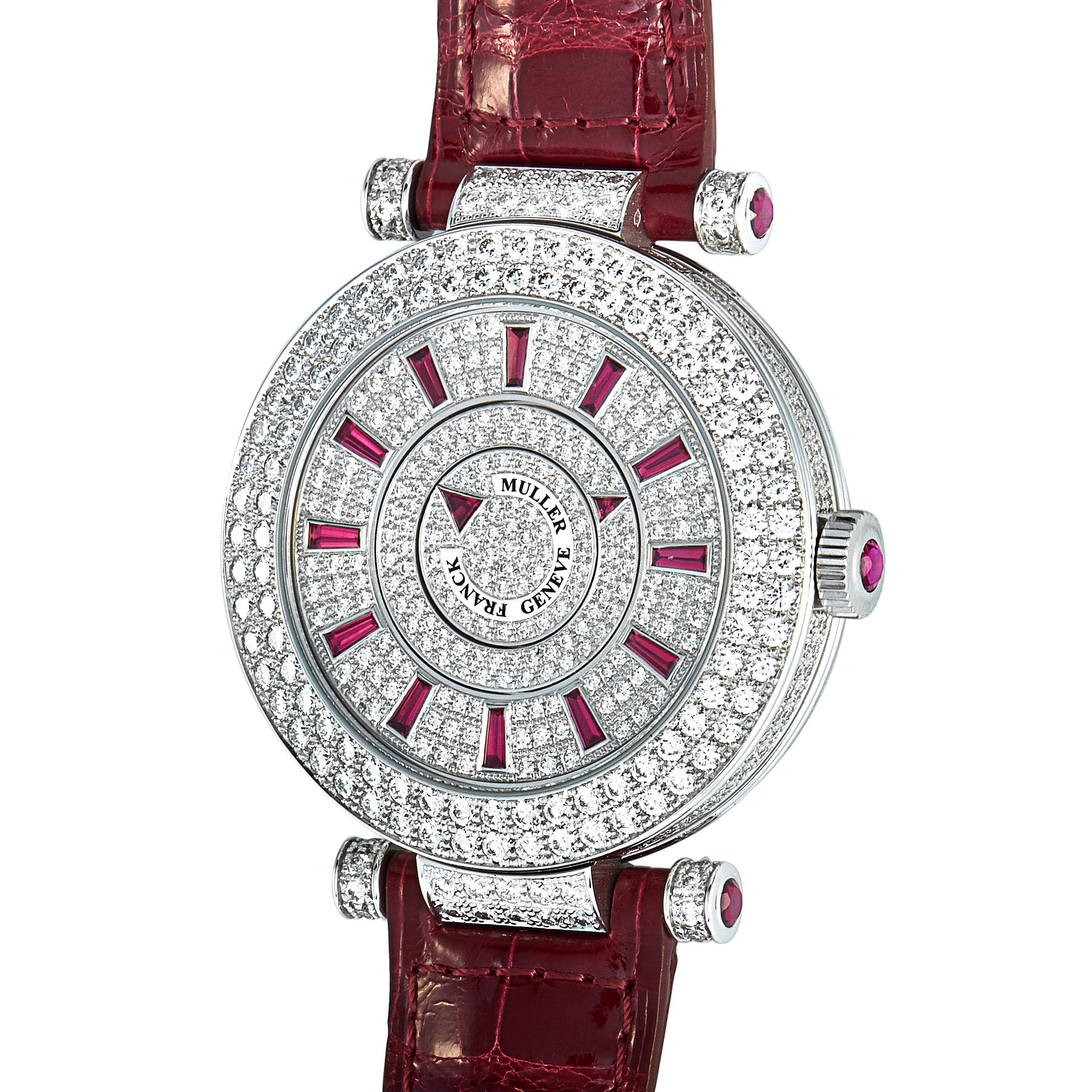 The Franck Muller Double Mystery, reference number DM 42 D 2R CD-Red, is presented with a diamond-set 18K white gold case that boasts see-through back. The case is mounted onto a red leather strap fitted with a diamond-embellished tang buckle.