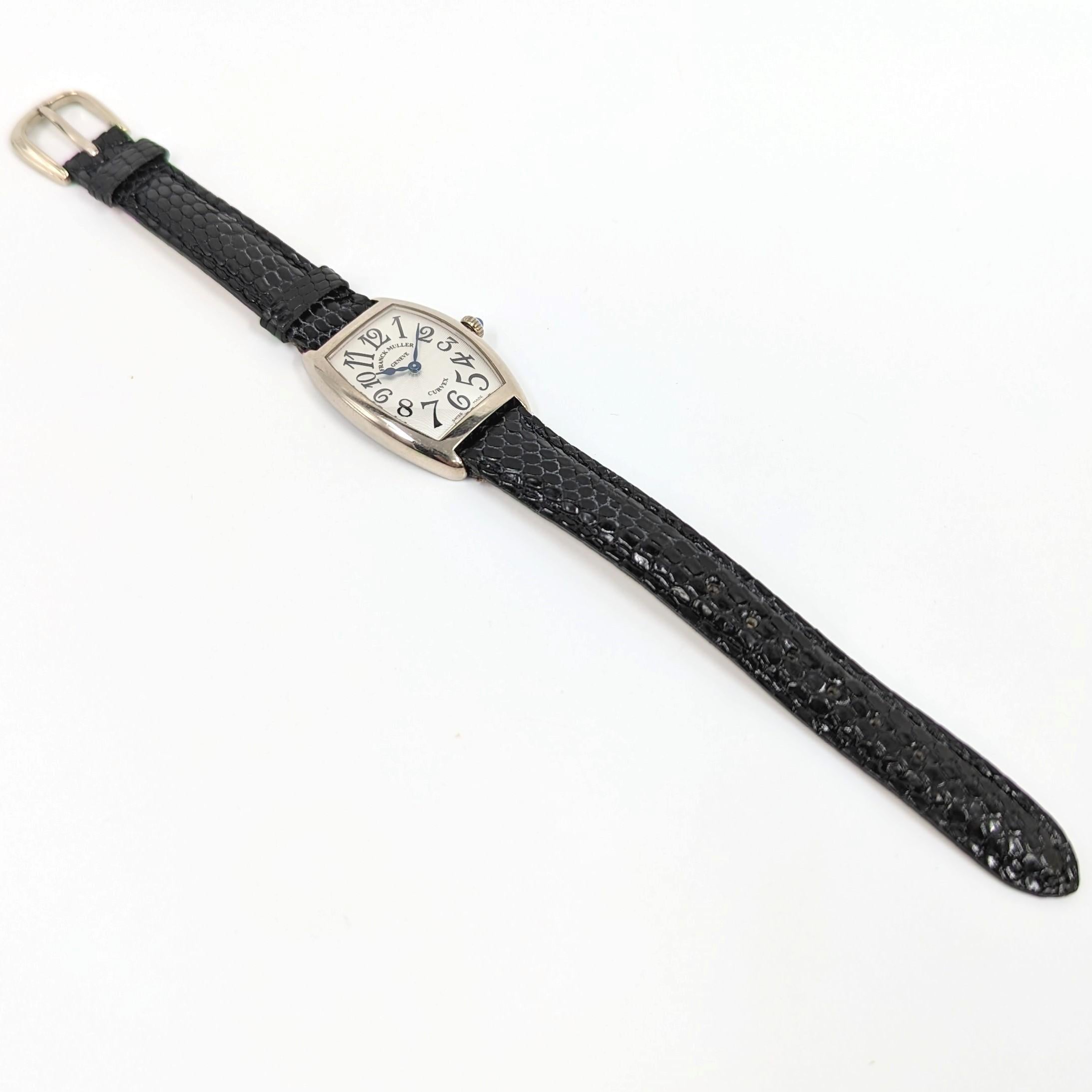 A  beautifully timeless Franck Muller Cintree Curvex ladies watch crafted in elegant solid 18k (au750) white gold, with a silvered guilloché dial, original FM 18k (au750) WG buckle and a black lizard strap 

Case back markings: FRANCK MULLER GENEVE