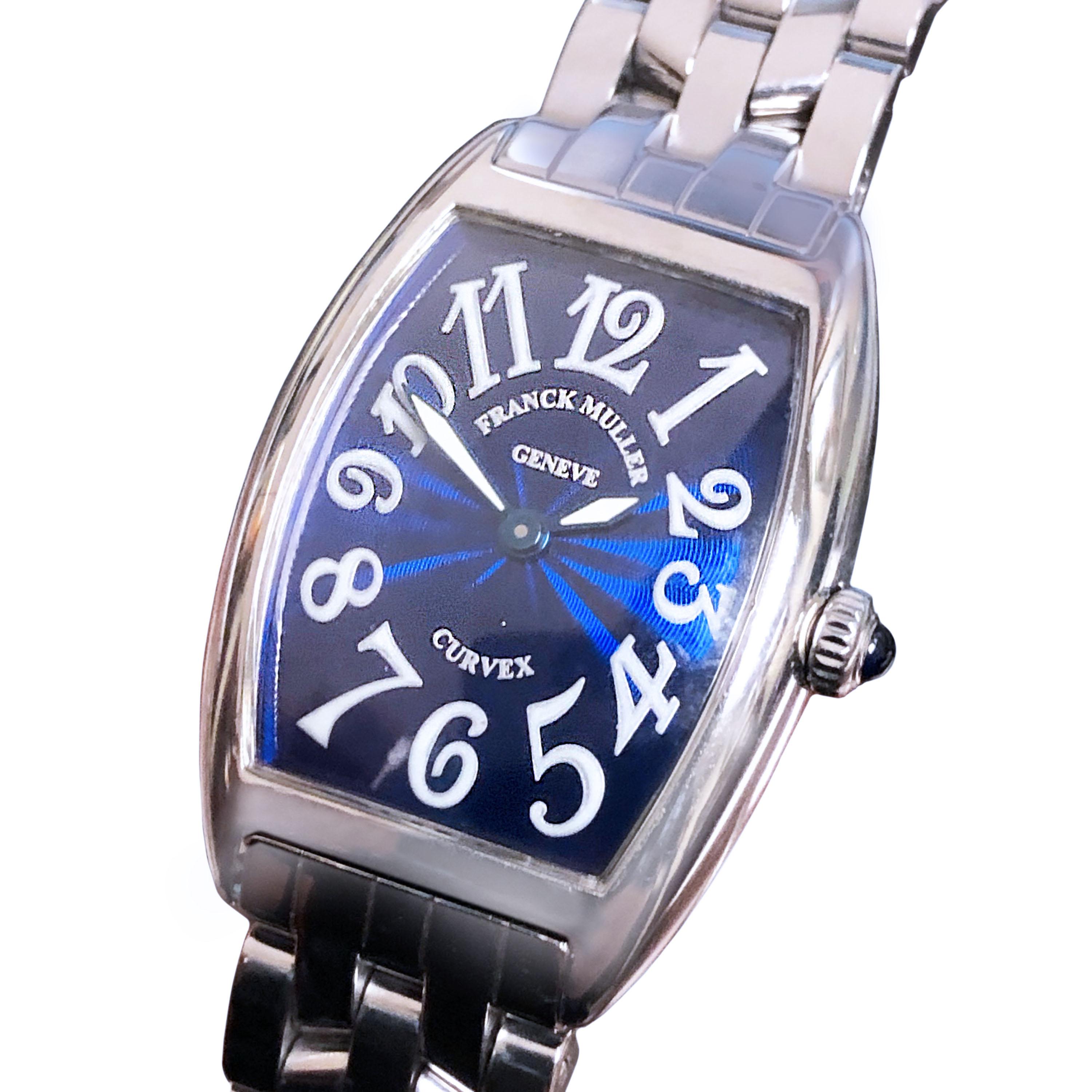 Circa 2005 Franck Muller Ladies Curvex Wrist watch, 35 X 25 MM Stainless Steel 2 piece case, Quartz Movement, Cobalt Blue Guilloche Enamel Dial, Sapphire crown. 5/8 inch wide integrated link bracelet with fold over deployment clasp. Watch length 6