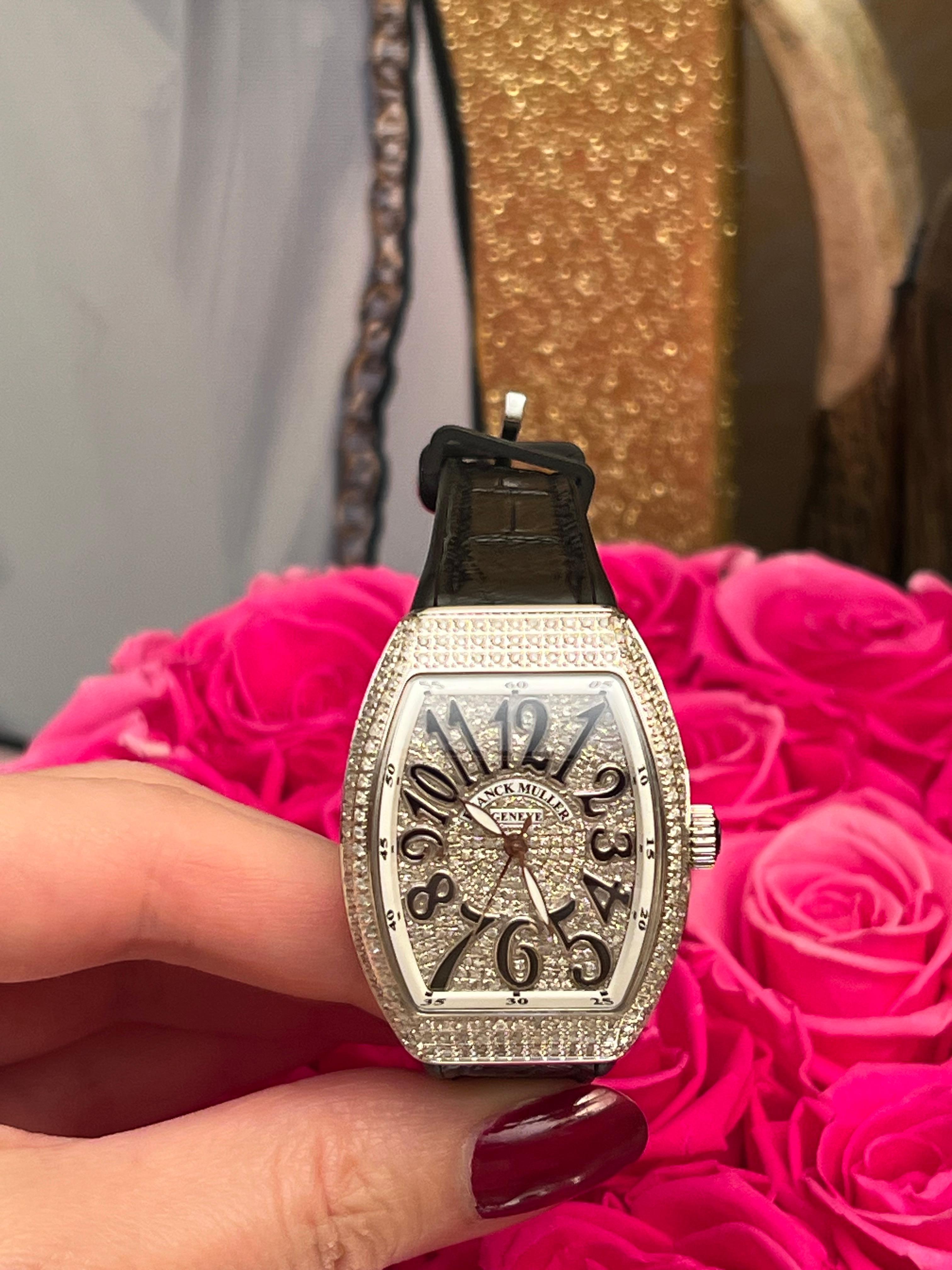 Franck Muller Lady Vanguard 32 Black Band Diamond Timepiece Watch.

From the Vanguard Collection. Franck Muller's Lady Vanguard watch features a gleaming diamond-encrusted bezel (aftermarket) and dial with distinctive appliquéhour