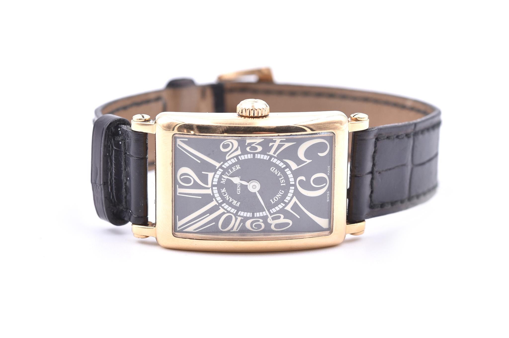 Movement: Quartz
Function: hours, minutes
Case: 36mm x 26mm 18k rose gold case, push/pull crown, sapphire crystal
Band: black leather strap with rose gold buckle
Dial: black dial with cream Arabic numerals
Serial #: 2XXX
Reference #: 900 QZ Long