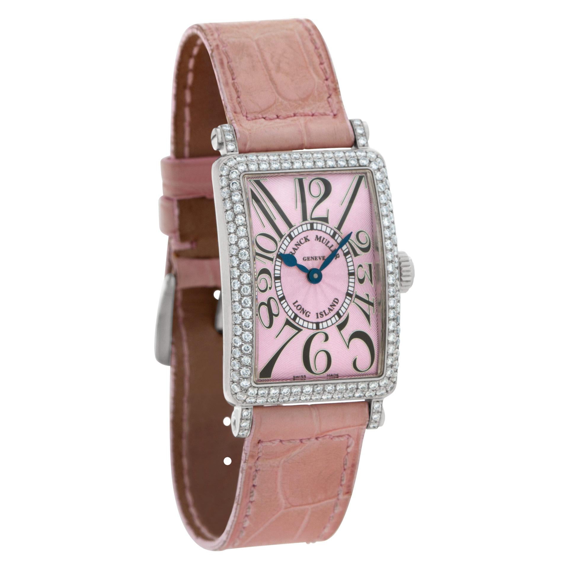  Franck Muller Long Island  Master of Complications with pink guilloche dial, 2 row diamond bezel, and diamond lugs 18k white gold on leather strap with 18k white gold tang buckle with diamond accents. Quartz. 23 mm x 32.5 mm case size. Ref 902 QZ