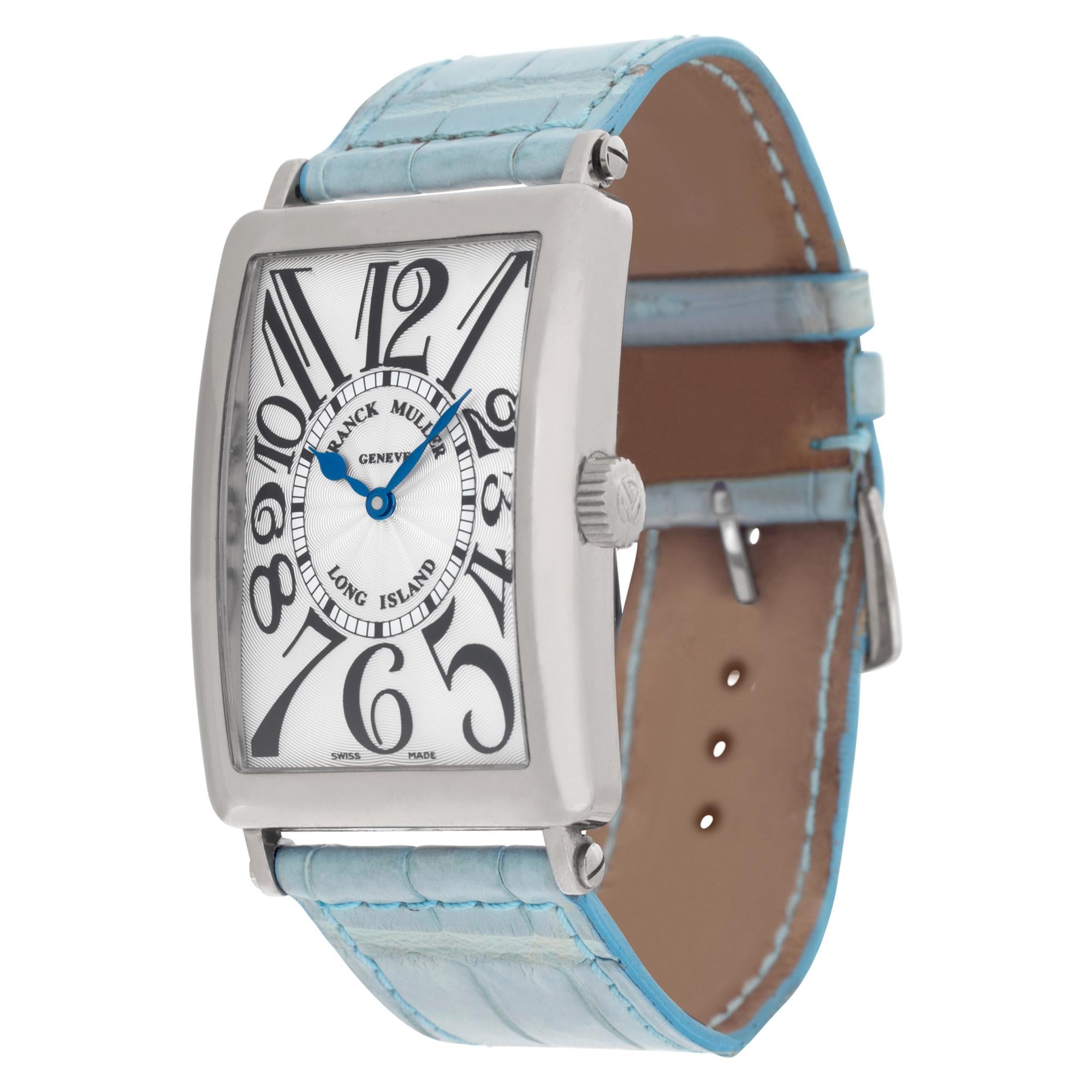 Franck Muller Long Island in 18k white gold on a powder blue alligator strap with 18k white gold FM tang buckle. Auto. 30.5 mm case size. Ref 1000SC. Comes with additional brand new peach colored strap. Fine Pre-owned Franck Muller Watch.

Certified