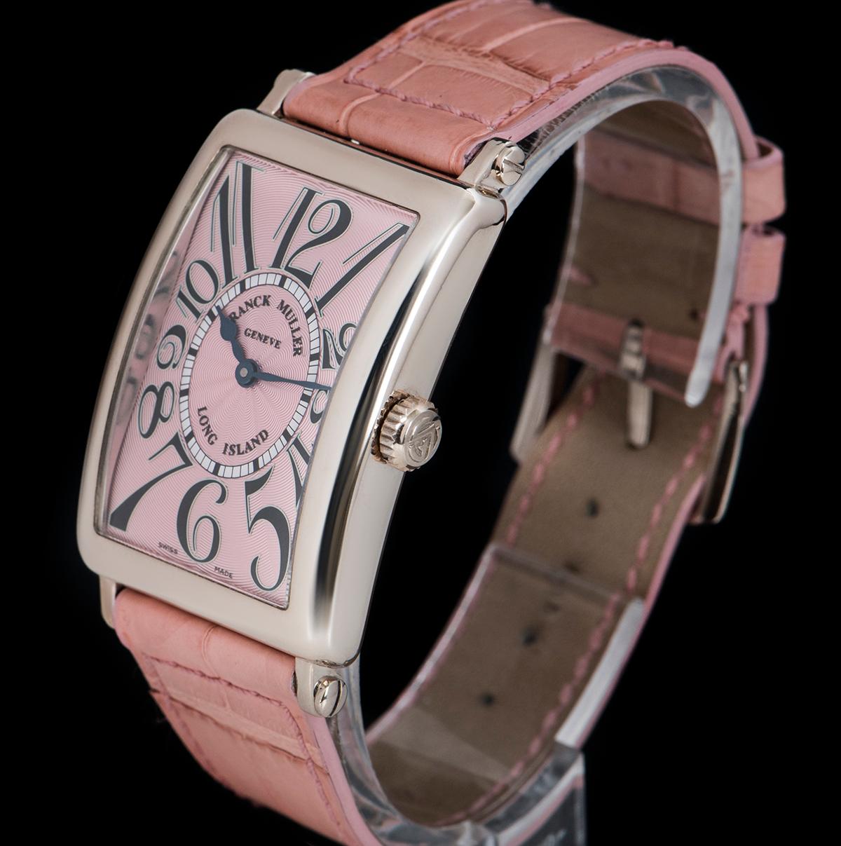 A 26 mm Franck Muller long island women's wristwatch, made from 18k white gold.

The pink guilloche dial with applied arabic numbers, is concealed behind a sapphire crystal, which is surrounded by a fixed 18k white gold bezel.

To complement the