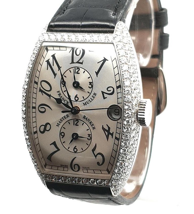 Franck Muller Master Banker 18 kt white gold & diamonds 5850 MBD

Extremely fine and beautiful Tripple time zone Franck Muller collector watch !

The solid white gold case is factory Diamond set with the finest quality diamonds.

This particular