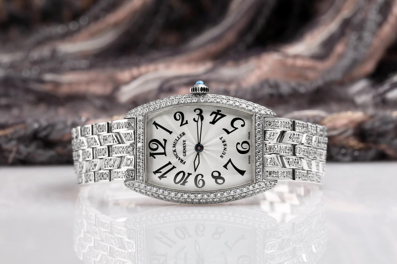 Franck Muller Sunset 1163 18K white gold watch customized with aftermarket diamonds. 