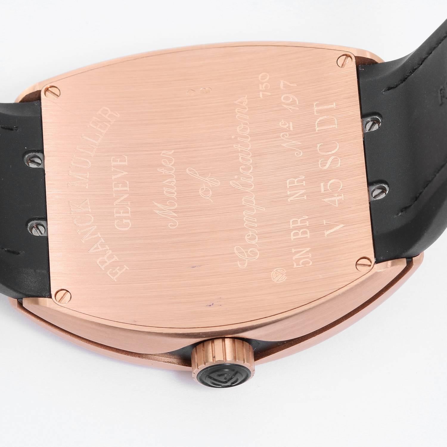 Franck Muller Vanguard 18K Rose Gold Men's Watch  V45 SC DT 5N BRN -  Automatic winding. 18k Rose Gold rectangular tonneau style  (45 x 53 mm). Black dial with Rose Gold outlined Arabic numerals; date at 6 o'clock. Black Franck Muller rubber strap