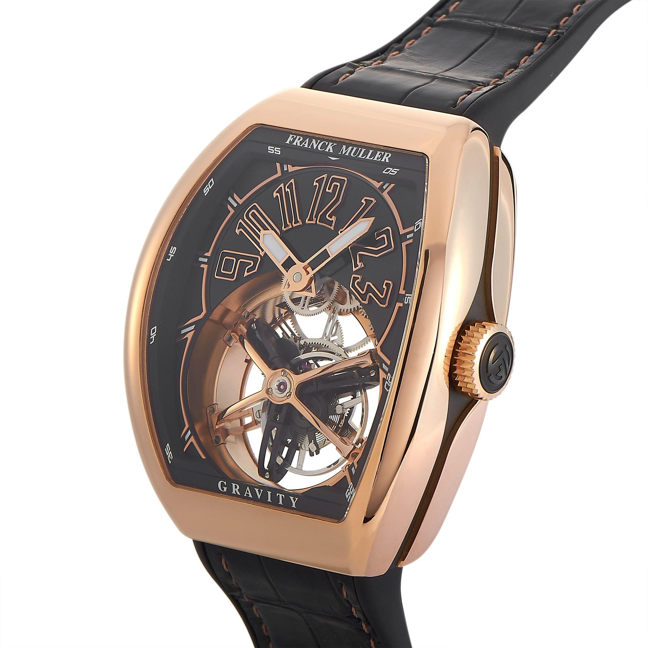 This Franck Muller Vanguard Gravity Tourbillon Watch features a rose gold case that measures 44 mm in diameter. The transparent case back offers a glimpse into the beautiful inner workings of the timepiece. The case is presented on a sleek black