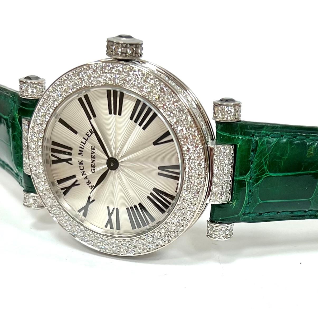 Franck Muller White Gold and Diamonds Ronde Watch   39mm
Silver Dial
Diamond Bezel   
Green Alligator Strap
Comes With Box and Papers
Retail $49,800.00