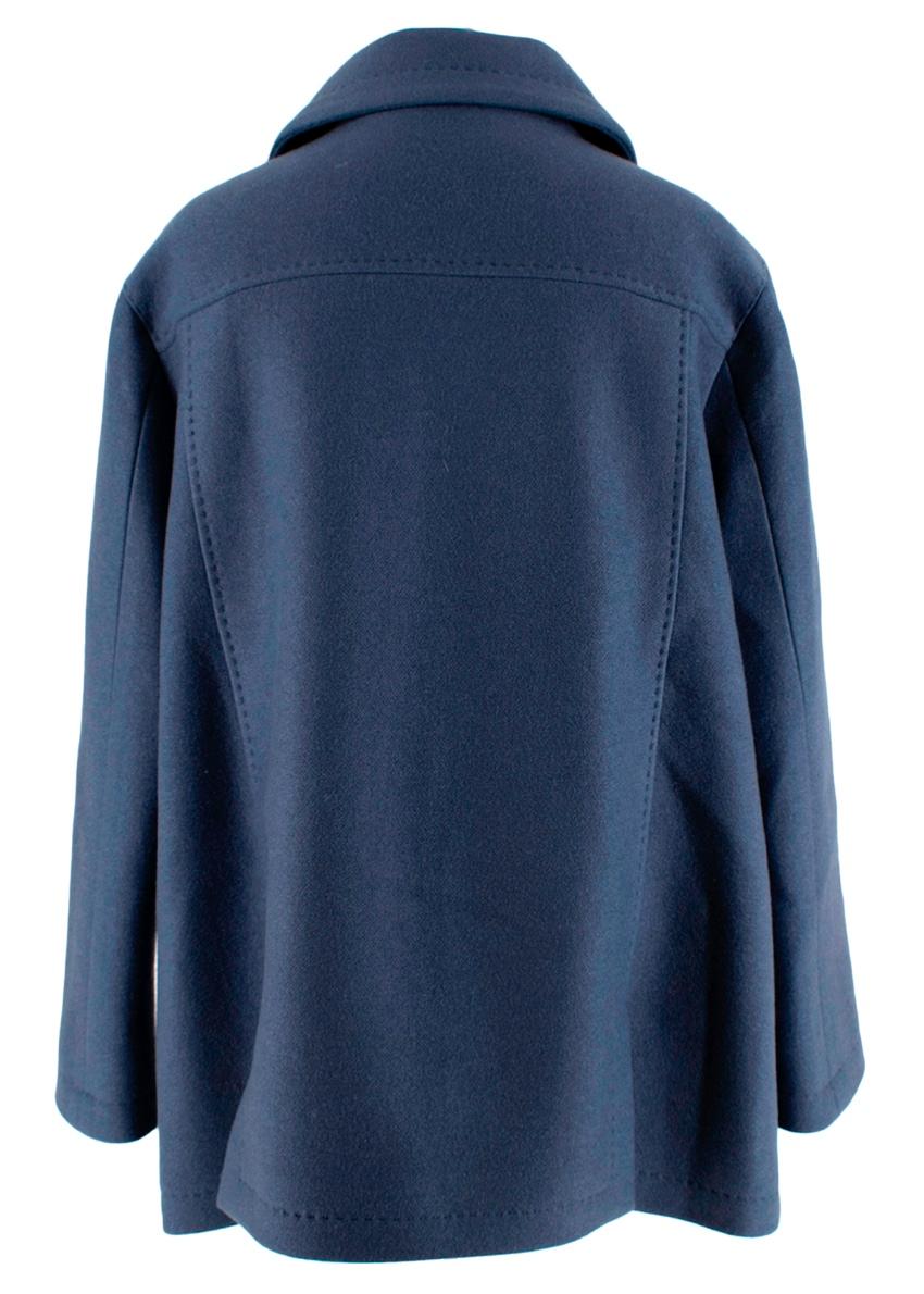 Franck Namani Blue Cashmere Double Breasted Jacket

-Luxurious soft cashmere texture 
-Double breasted classic cut 
-Gorgeous blue hue 
-Branded buttons 
-Pockets to the front 
-Satin silk lining 
-Button fastening to the front 
-Fully lined 
-Top