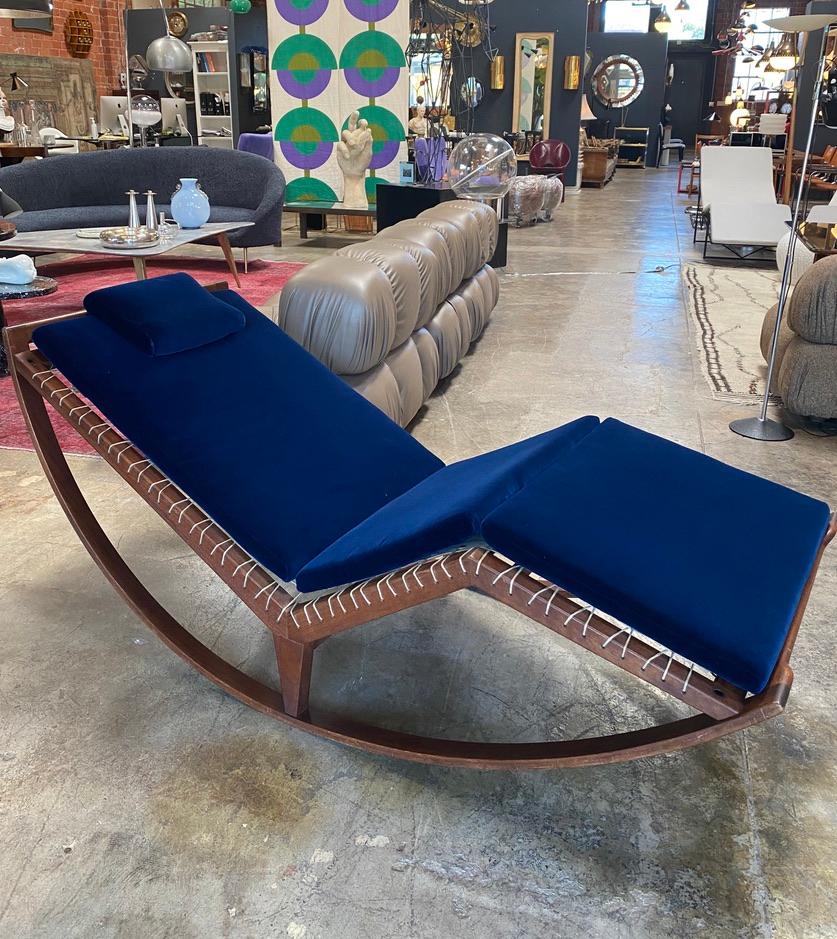 Franco Albini rocking chaise lounge, constructed of walnut, canvas and cord with original fabric velvet blue pillow and manufactured by Poggi, Pavia, Italy, 1956. Chaise is in original condition.