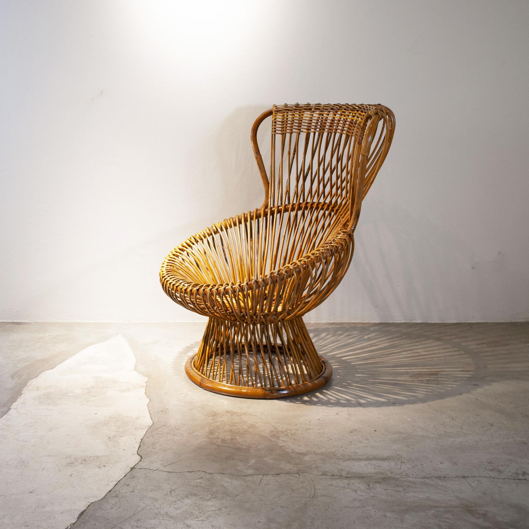 An iconic cane armchair designer Franco Albini model Margherita for Bonacina 1960s.
