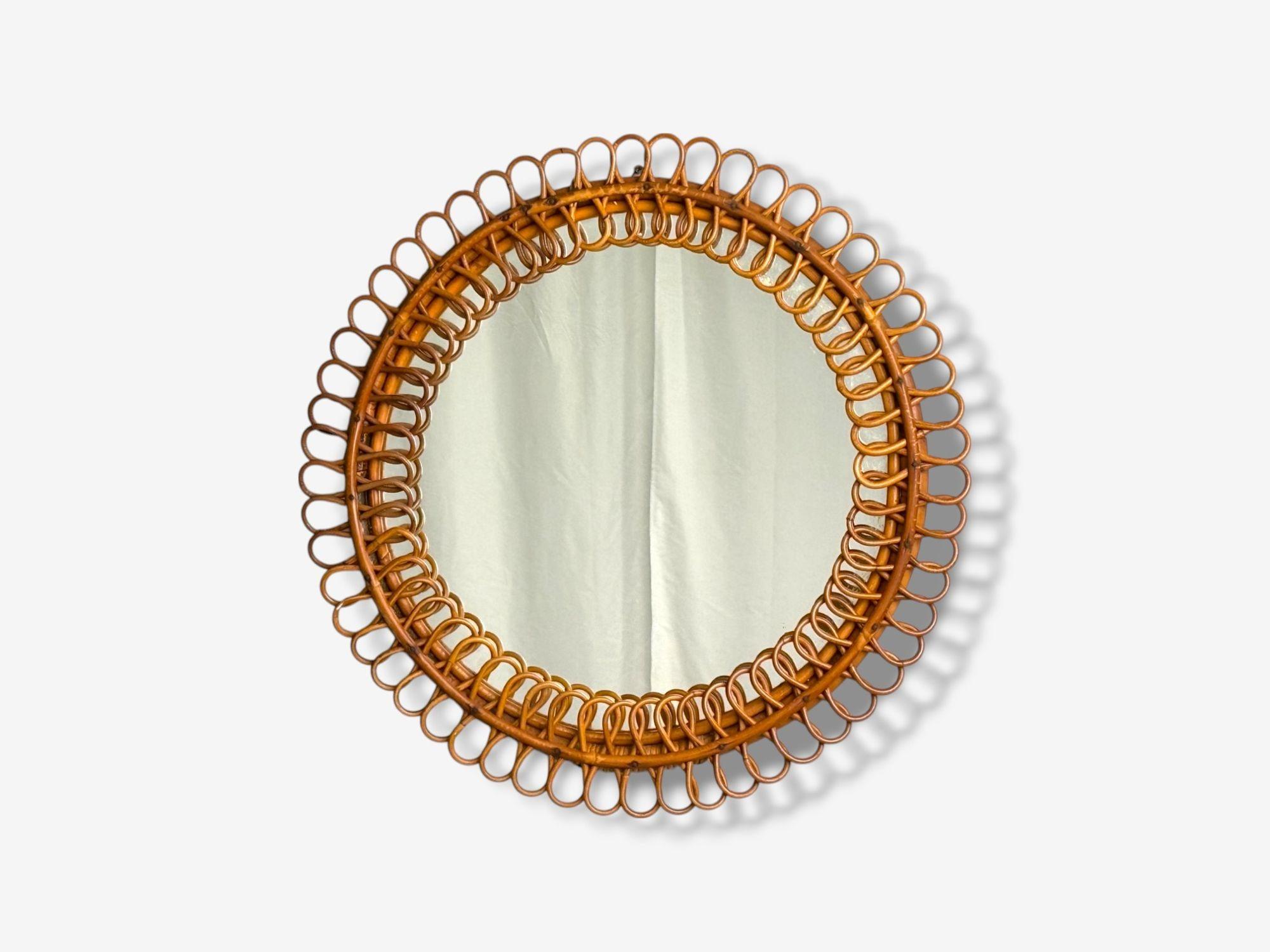 Franco Albini attr., Bonacina, Miroir mural italien du milieu du siècle, bambou, canne, Italie, années 1950

Un très bel exemple de petit miroir mural rond en bambou, canne et verre attribué à Franco Albini et produit par Bonacina en Italie vers les