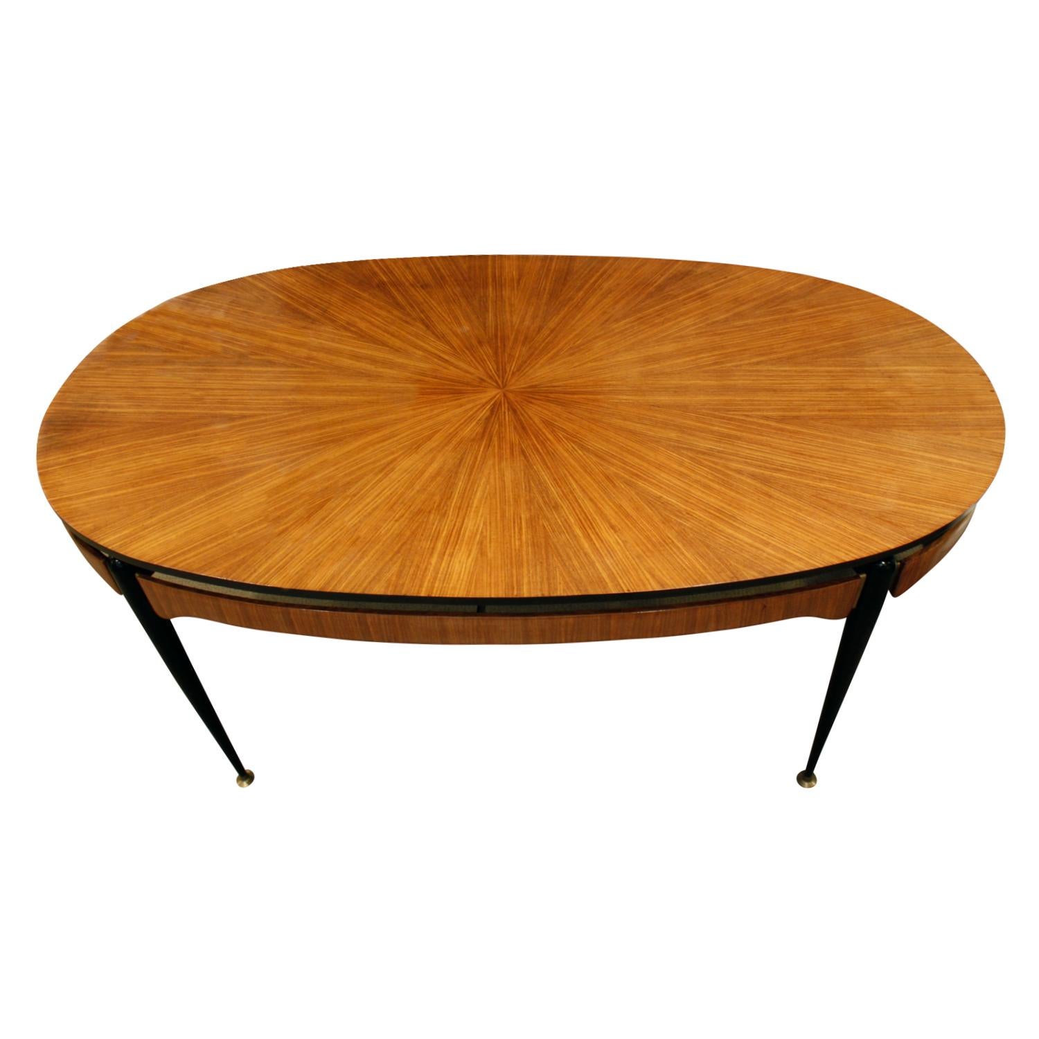 Racetrack dining table with radiating rosewood top and metal base attributed to Ico Parisi, Italy, circa 1954.