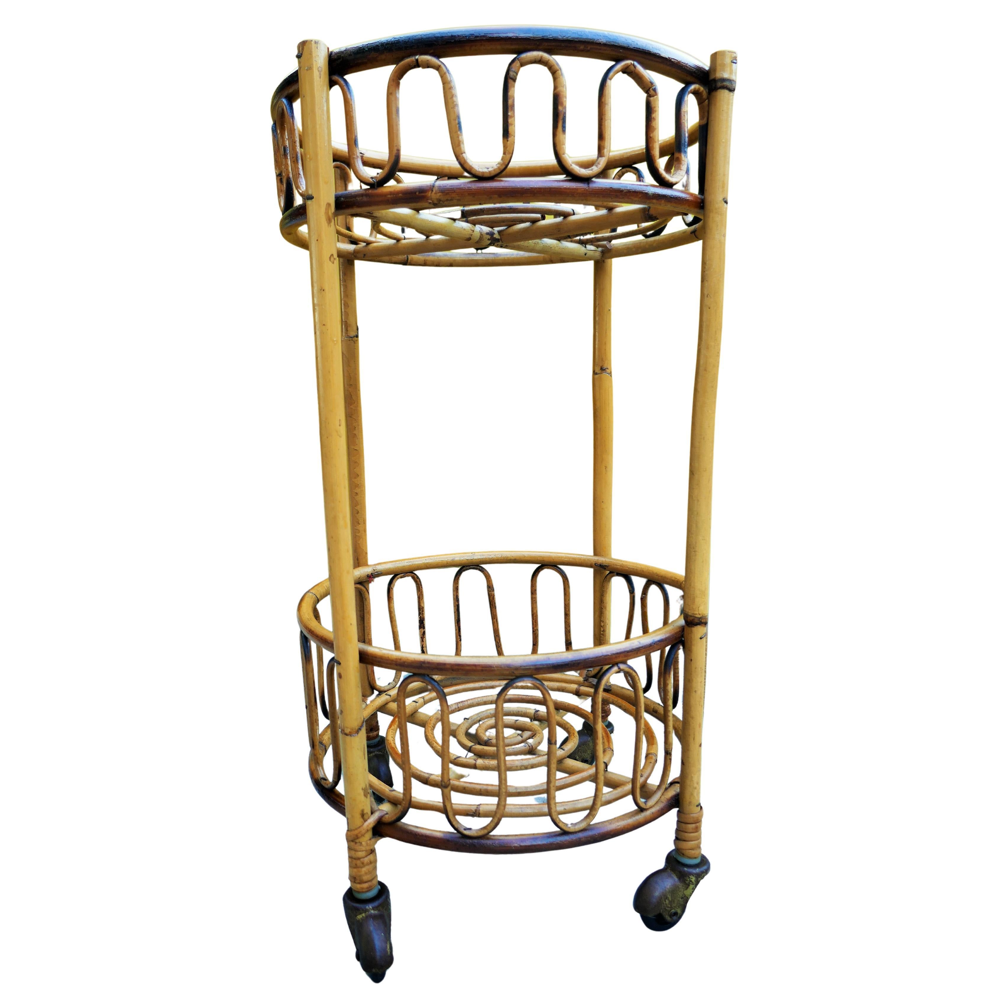 Franco Albini style rattan trolley.
Good condition.
Thanks