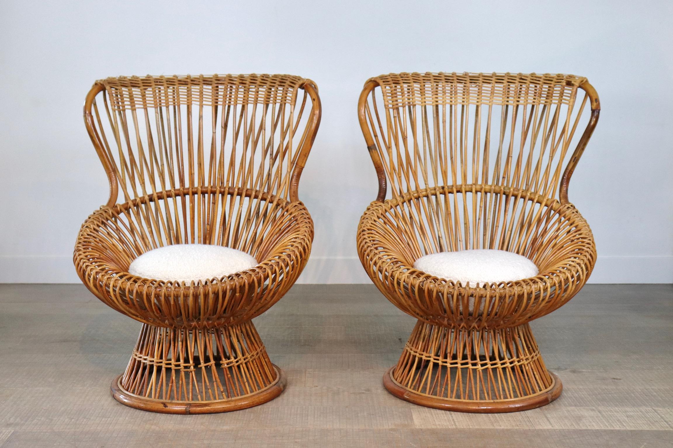 Beautiful rattan chairs by Franco Albini, manufactured by Bonacina. This design won the award of the Milan Triennale in 1951. Beautiful authentic piece and an eyecatcher in any interior. 

Dimensions: H100 x W75 x D80 cm 
Seat height: 40cm