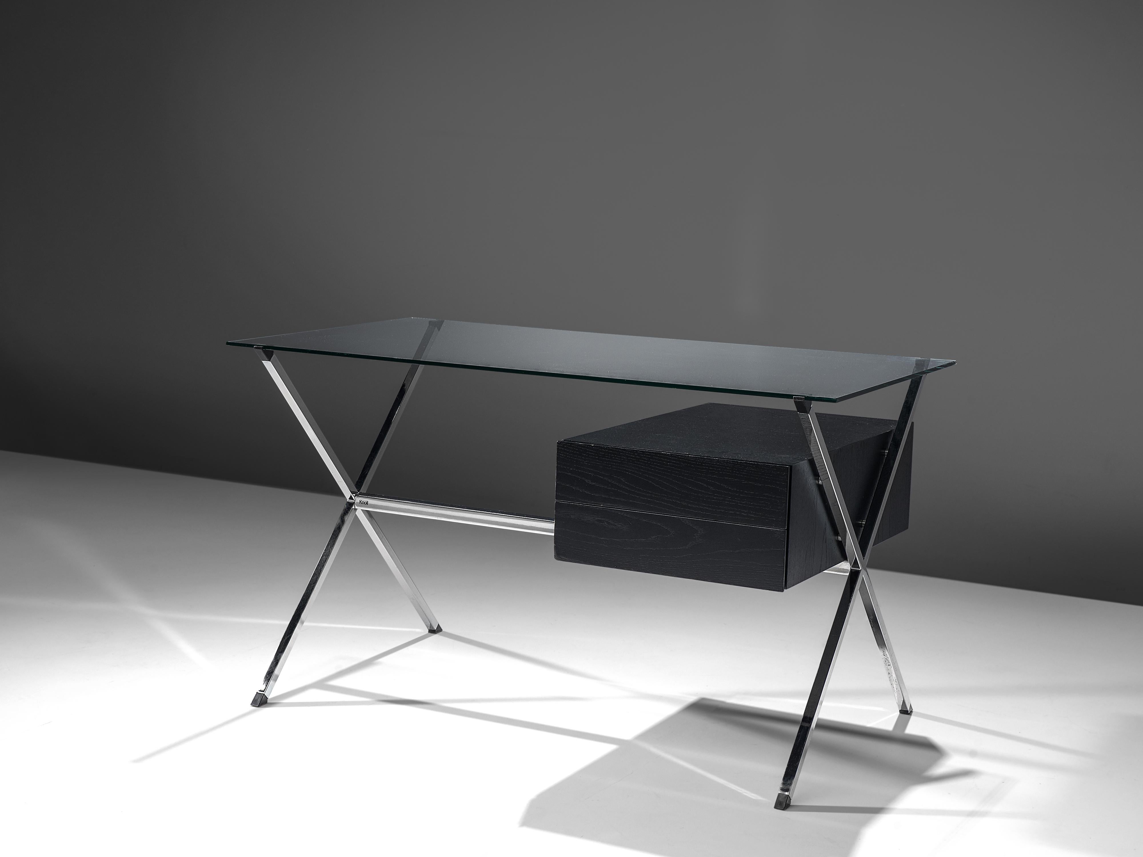 Franco Albini for Knoll, desk model '1928', glass, wood, chromed steel, Italy, design 1949

Franco Albini’s '1928' desk combines glass, steel and wood which results in a minimalistic balance. The desk features Albini’s design philosophy and