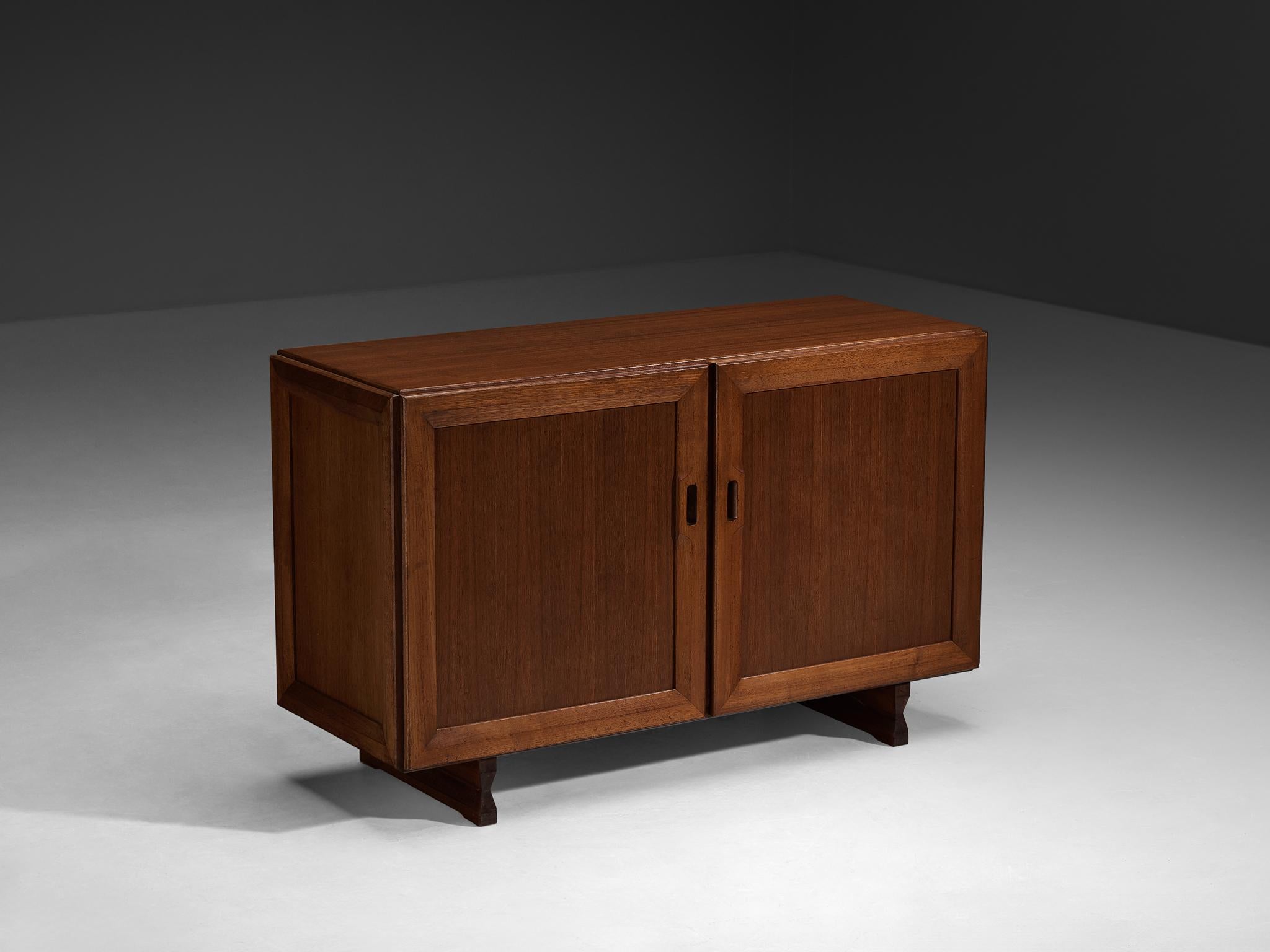 Franco Albini for Poggi, cabinet, model ‘MB51’, teak, Italy, 1958 

This exquisitely designed cabinet by Franco Albini for Poggi epitomizes simplicity with its sharp, clean lines. The cabinet's body is elegantly elevated by sculptural legs. The