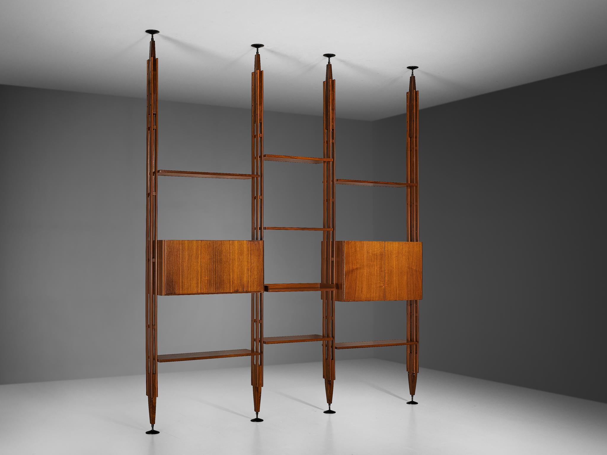 Franco Albini for Poggi, wall unit, model 'LB7', teak, metal, brass, Italy, 1957

A multi-functional design doubling both as wall unit and room divider, created by the Italian Franco Albini for Poggi in 1957. This piece is build up from three