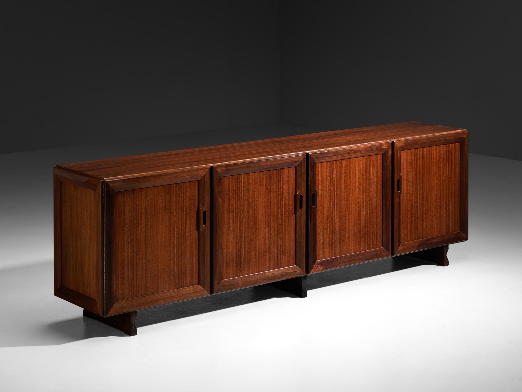 Franco Albini for Poggi, sideboard, model 'MB15', teak, Italy, 1957

This well-designed, sizable sideboard by Franco Albini for Poggi, created in 1950s Italy, epitomizes mid-century modern design sensibility with its sheer form and clean lines. Four