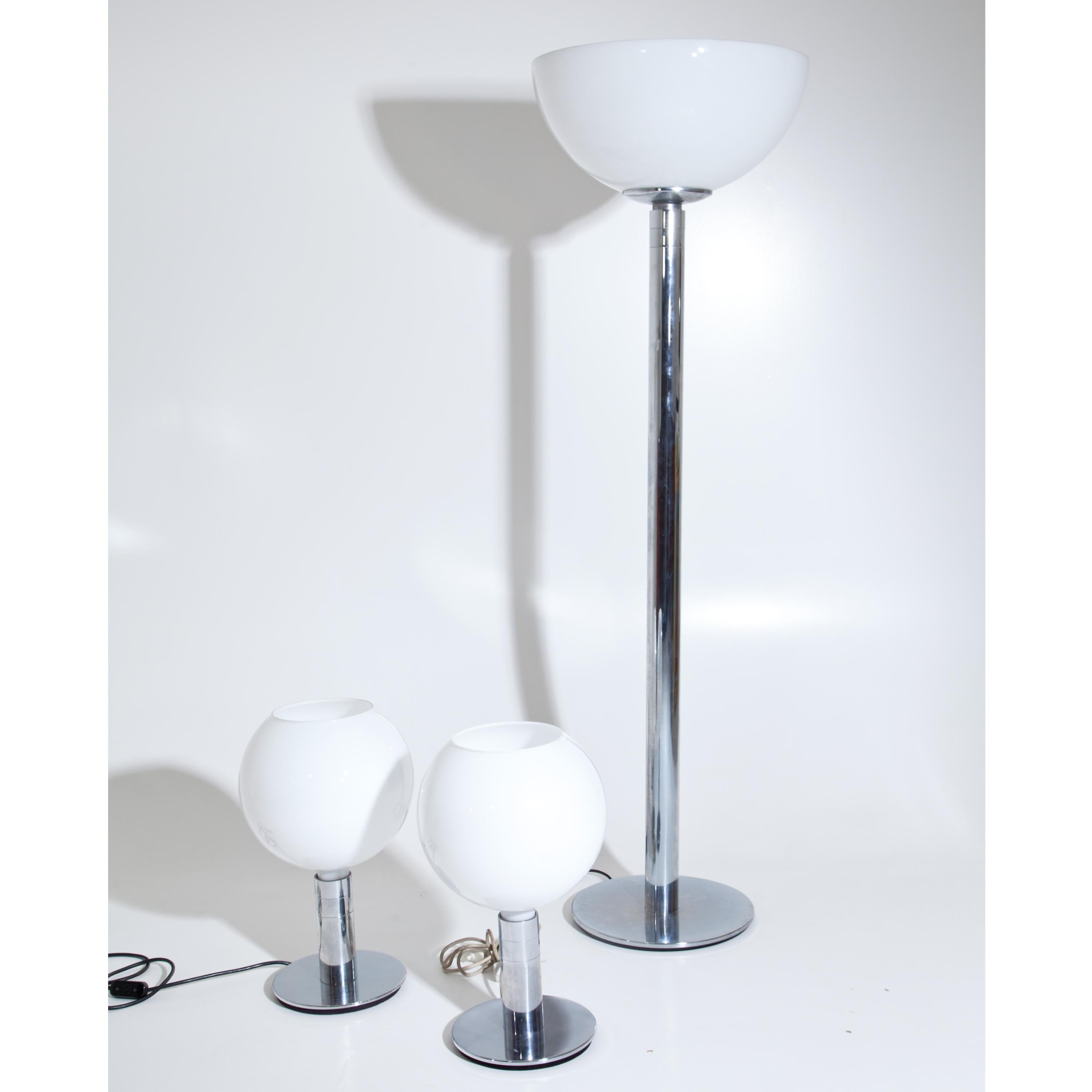 Tall floor lamp on round chrome-plated base and opaline glass shade with wide opening. In the base embossed 