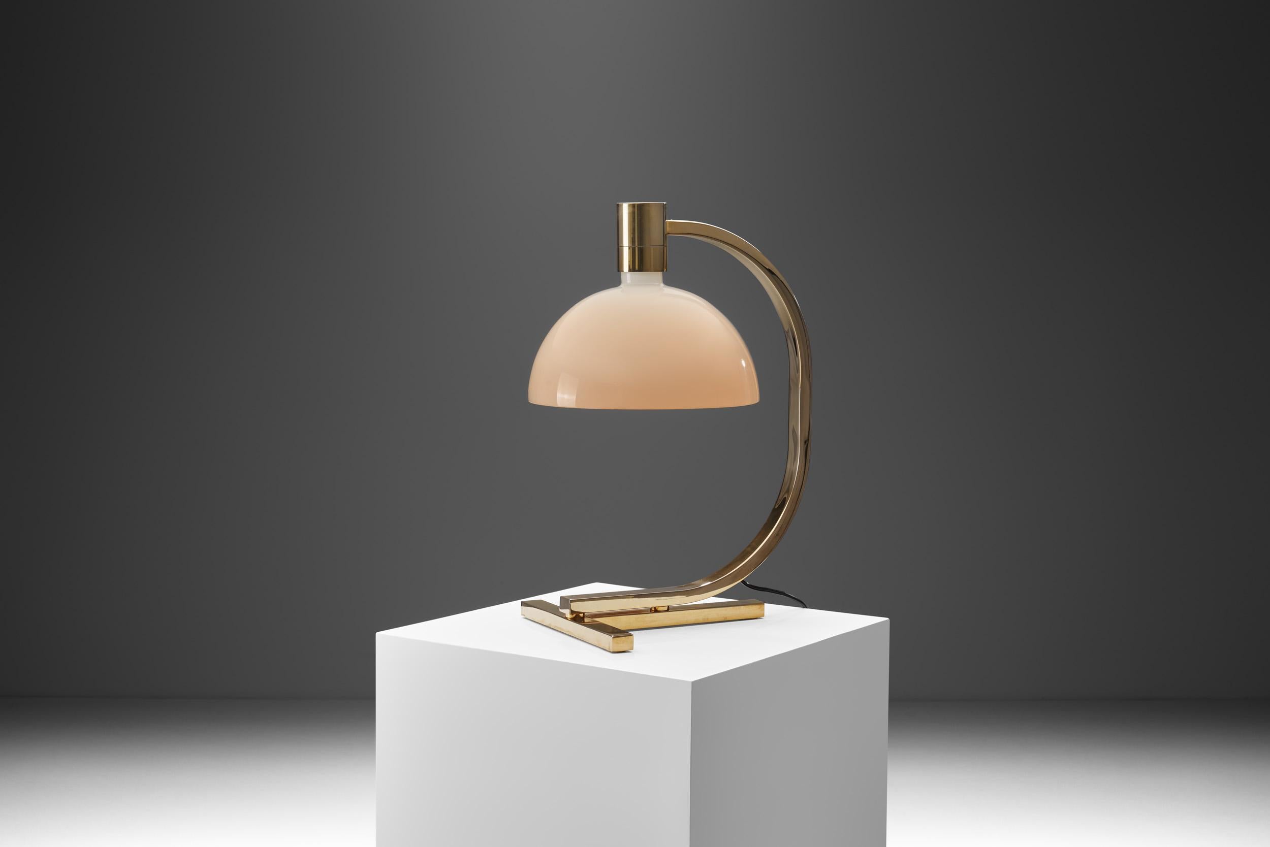 Minimal in form from concept to design, this historical lamp emerged from a traditional Italian craftsmanship practice. Using modern, artisanal materials for the design the designers applied a modern aesthetic to the design and construction of this