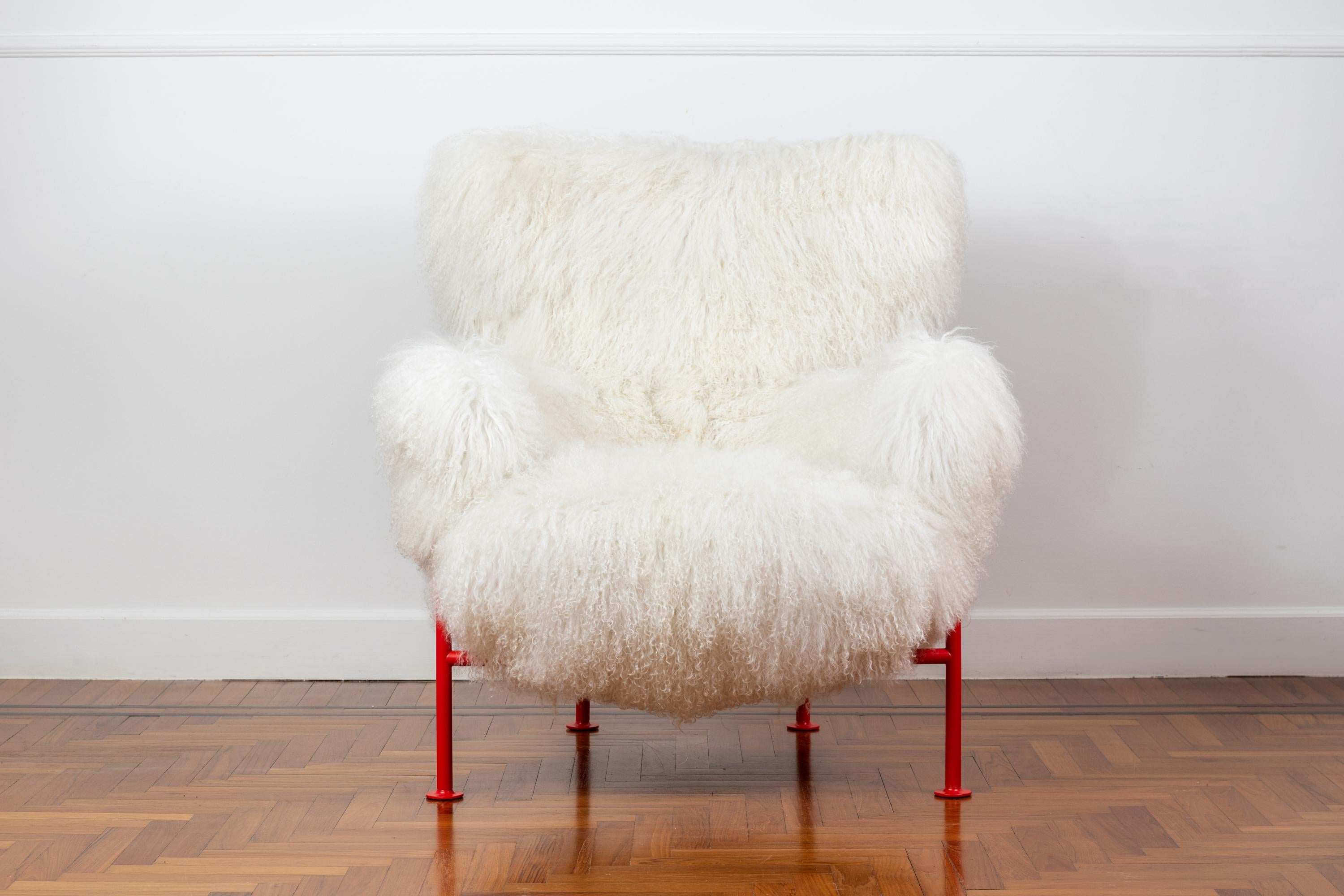 836 or 'Tre Pezzi' armchair designed by Franco Albini and Franca Helg in 1952 for Cassina. 
This is a special limited re-released available in 100 pieces, made of a structure in red tubular lacquered metal and upholstery is in white Mongolia