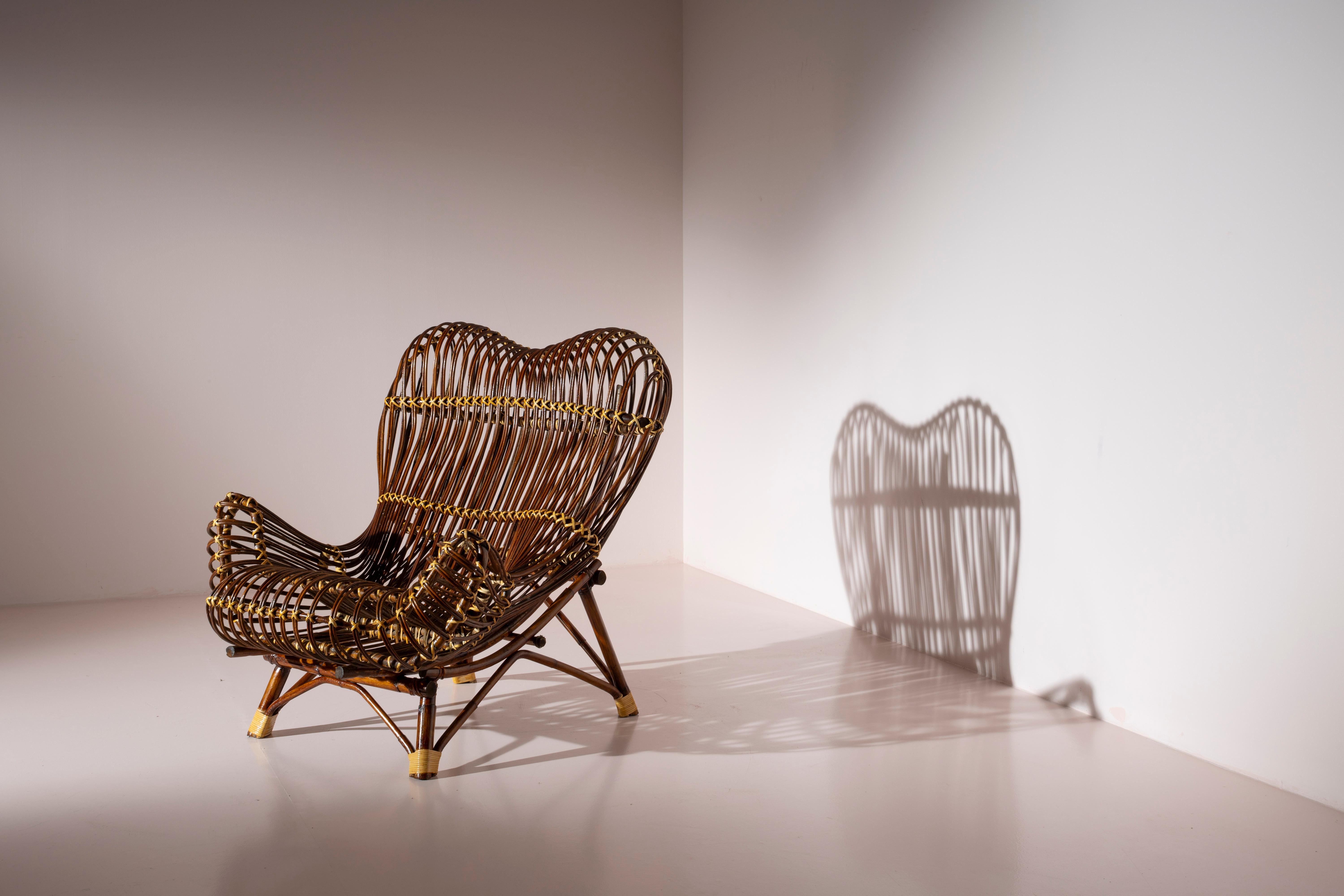 A beautiful chair in bamboo and straw, Gala model, designed by Franco Albini in 1951, produced by Bonacina.

The Gala chair, designed in 1951, embodies all the desires for novelty and progress necessary to move away from the rubble of the war that