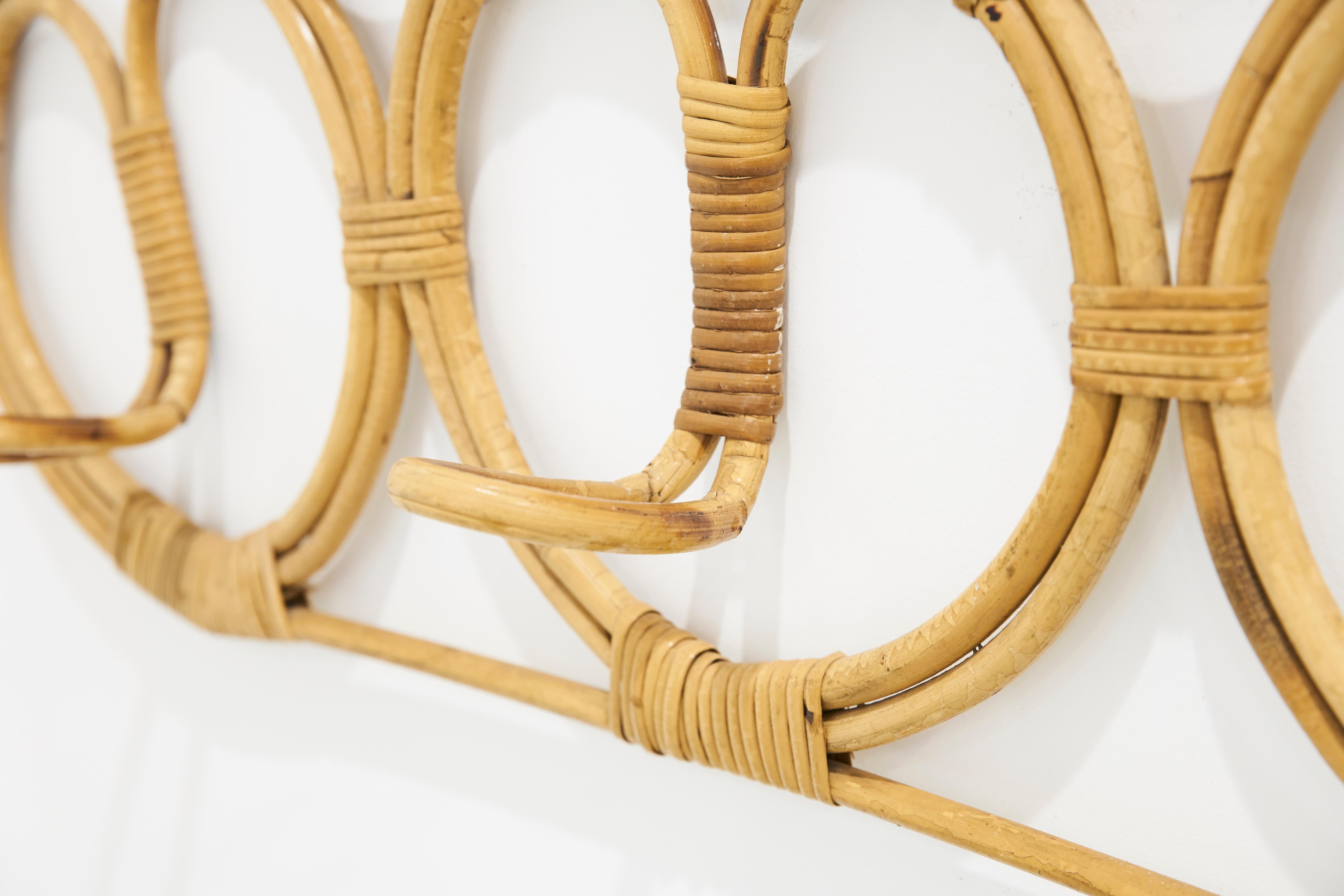 Rattan coatrack design by collaboration of Franco Albini & Helg Franca

Measures: cm 97 x 36 e 83 x 49.