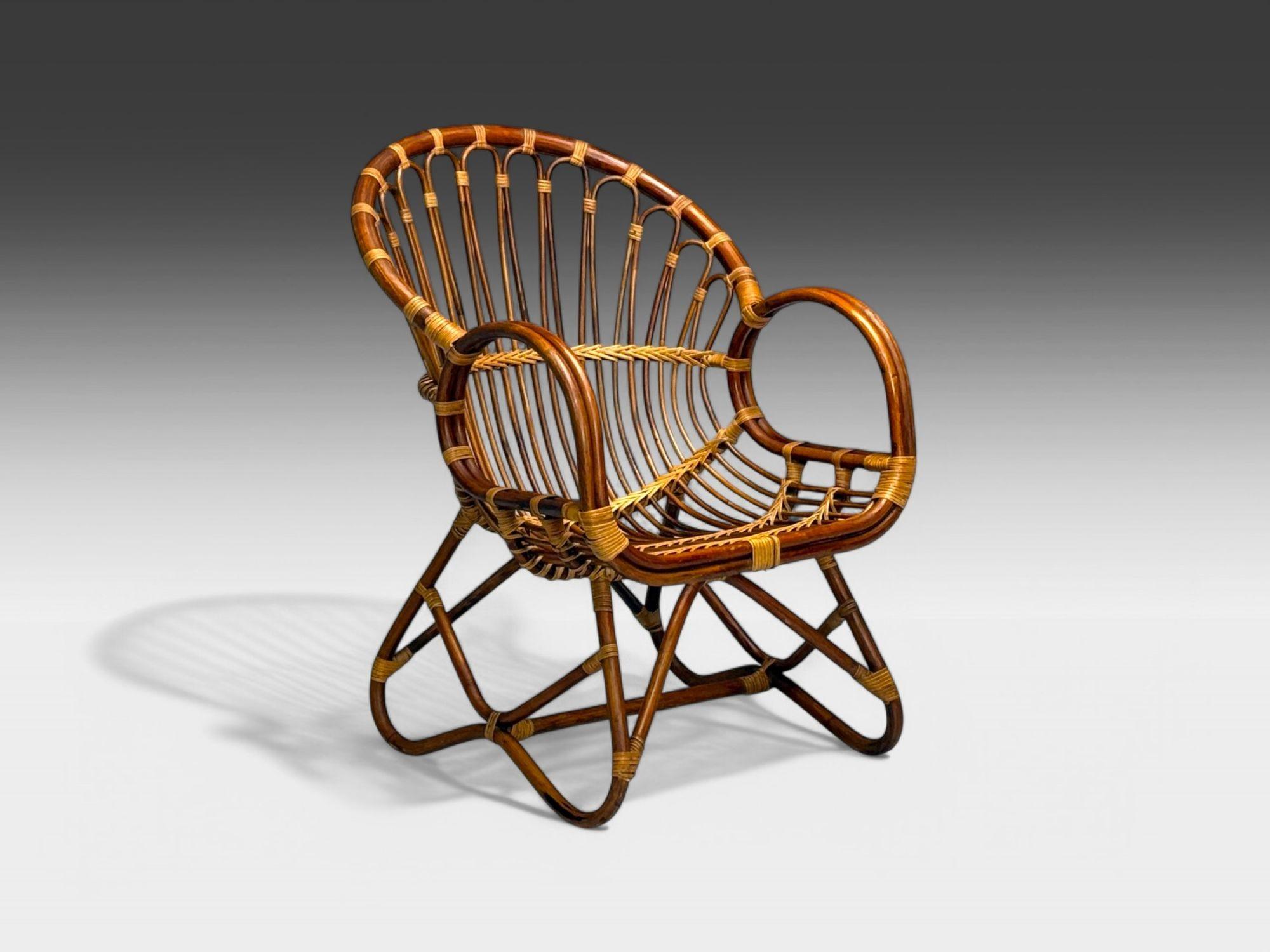 Franco Albini, Italian Mid-Century Modern, Bamboo, Rattan, Lounge Chair, 1960s

An organic modern rattan lounge chair by Franco Albini and produced in Italy circa 1960s. This piece features elegant rounded armrests, a sculptural backrest, and finely
