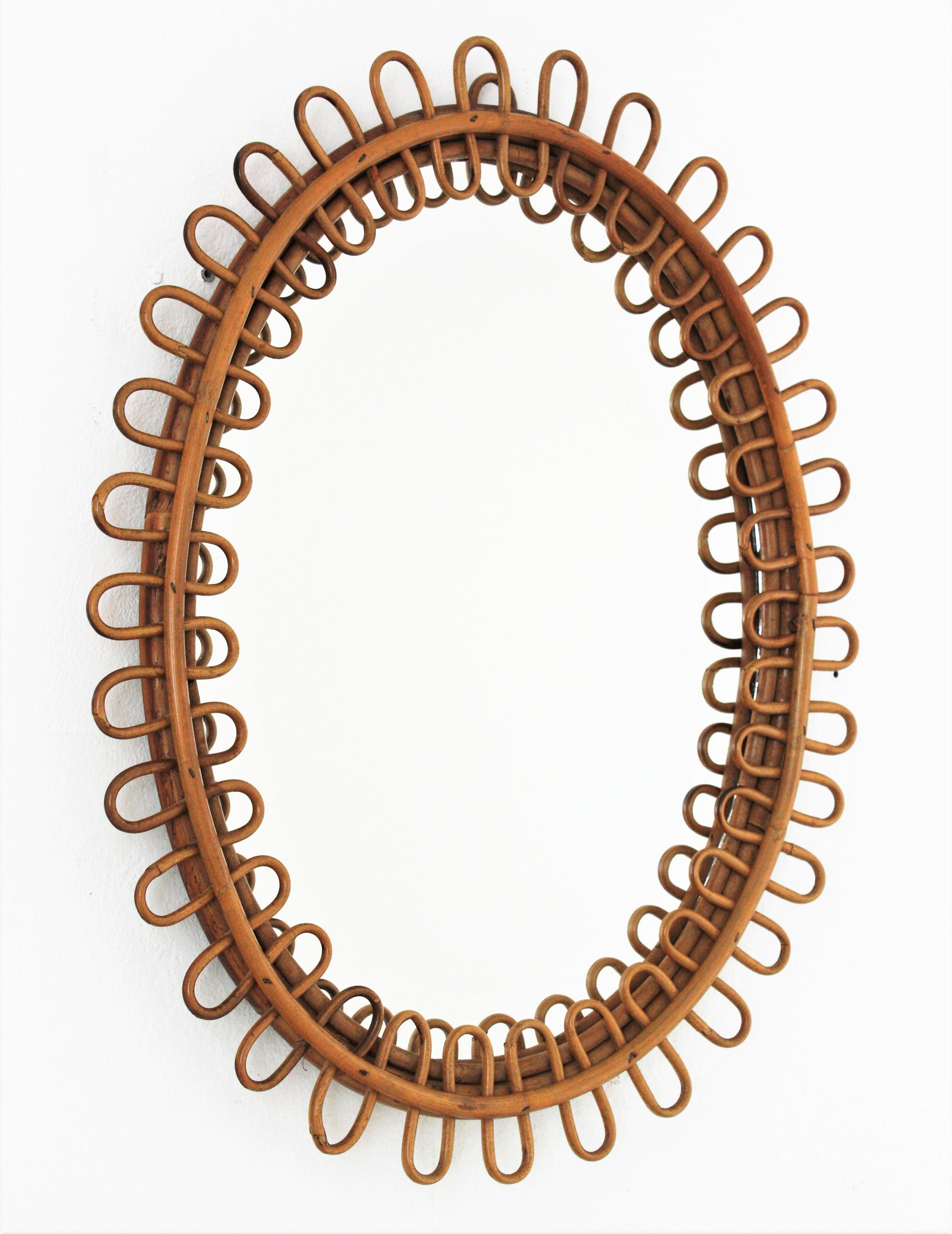 rattan oval mirror